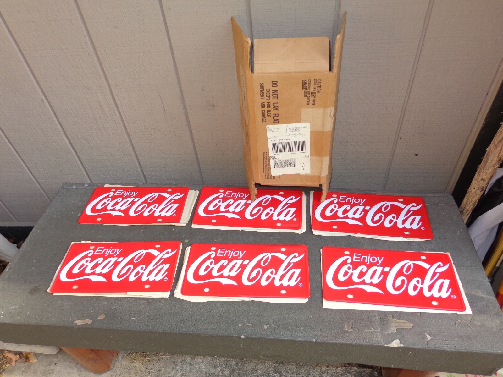 VINTAGE NOS ENJOY COCA COLA STOUT SIGN COMPANY CASE OF 6 METAL ADVERTISING Z501