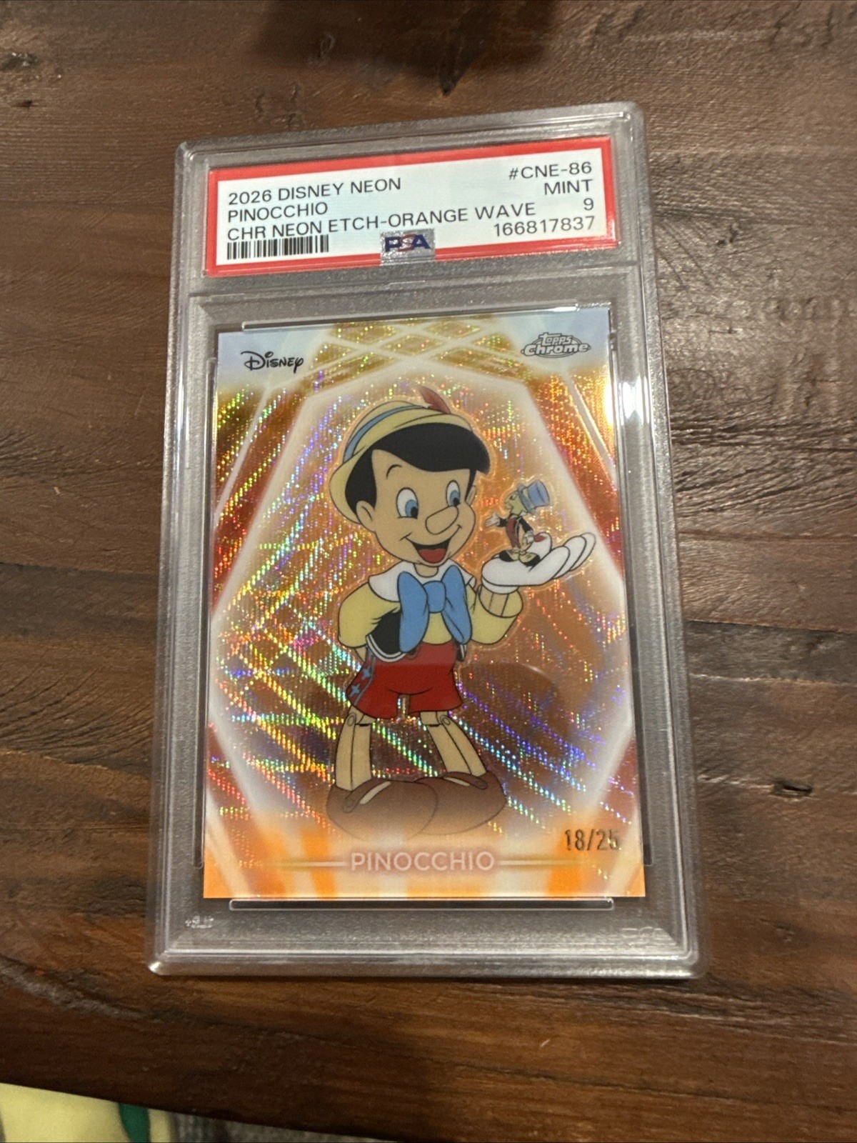 2024 Topps Chrome Disney Neon Pinocchio Etch-Orange Wave /25 PSA 9