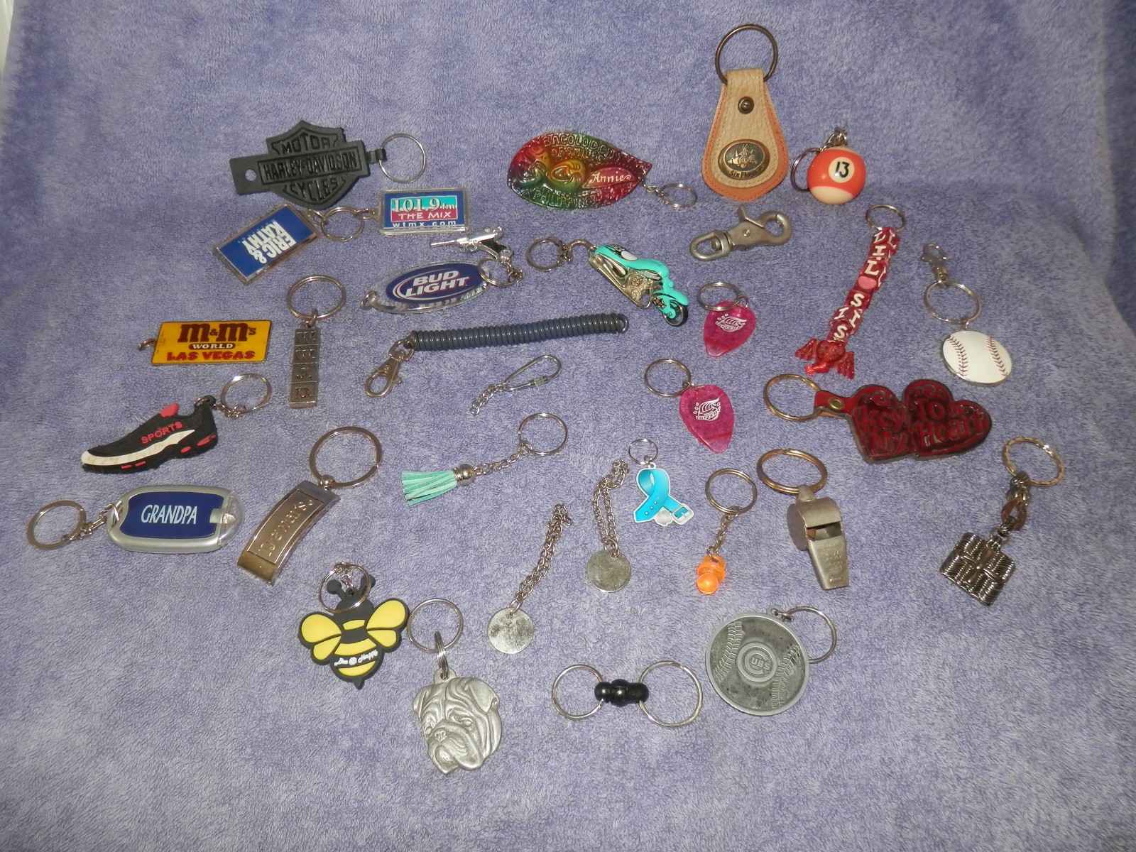 Large lot of key chains , cubs, m&m\'s six flags Bud light Harley Davidson & more