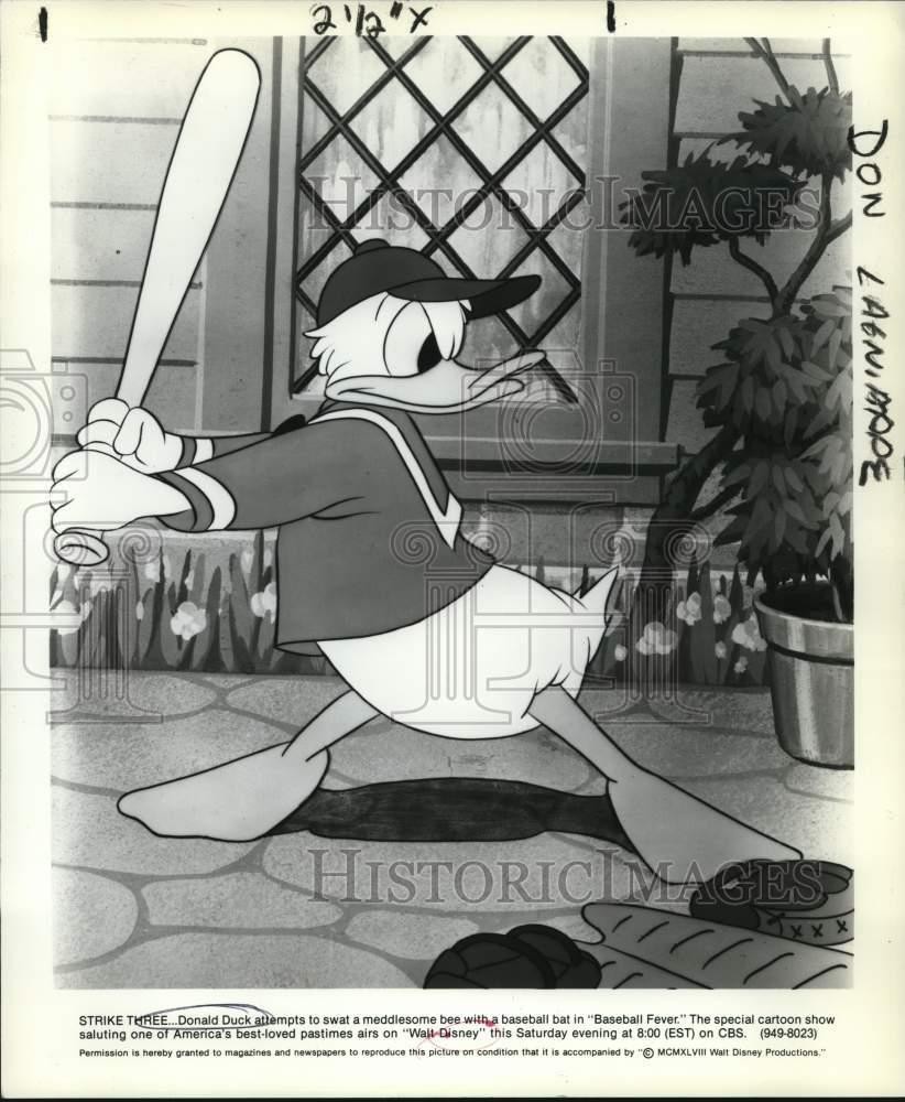 1948 Press Photo Donald Duck swats bee in \