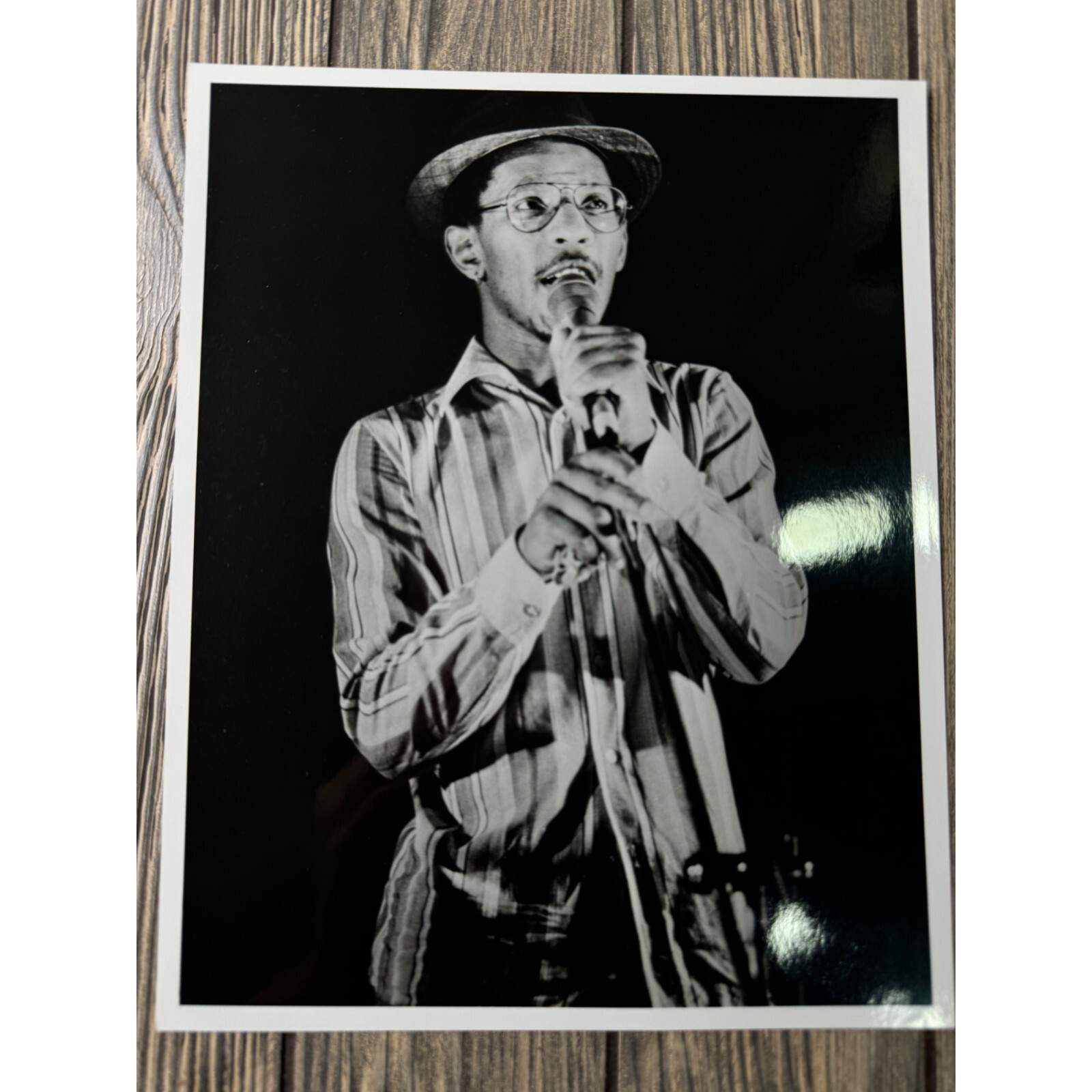 Vintage Black and White Photo Of Jazz Musician With Microphone