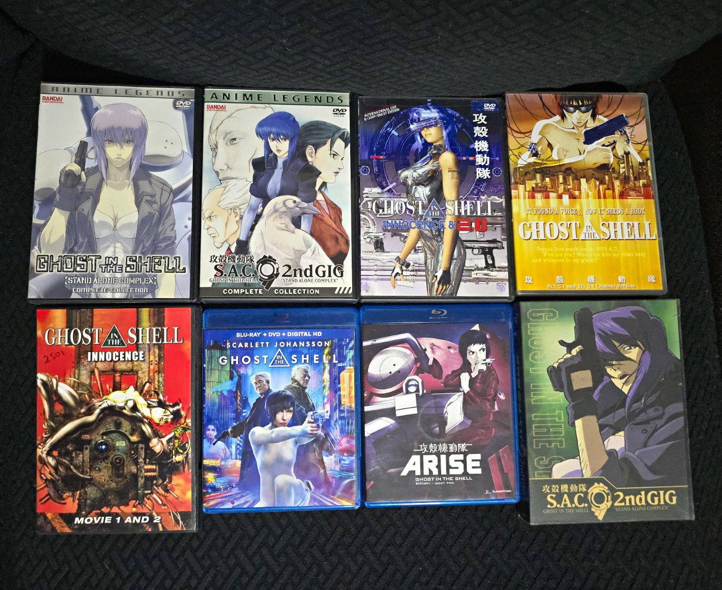 Ghost in the Shell DVD/Blu-ray Lot 59 discs near mint, missing cases.
