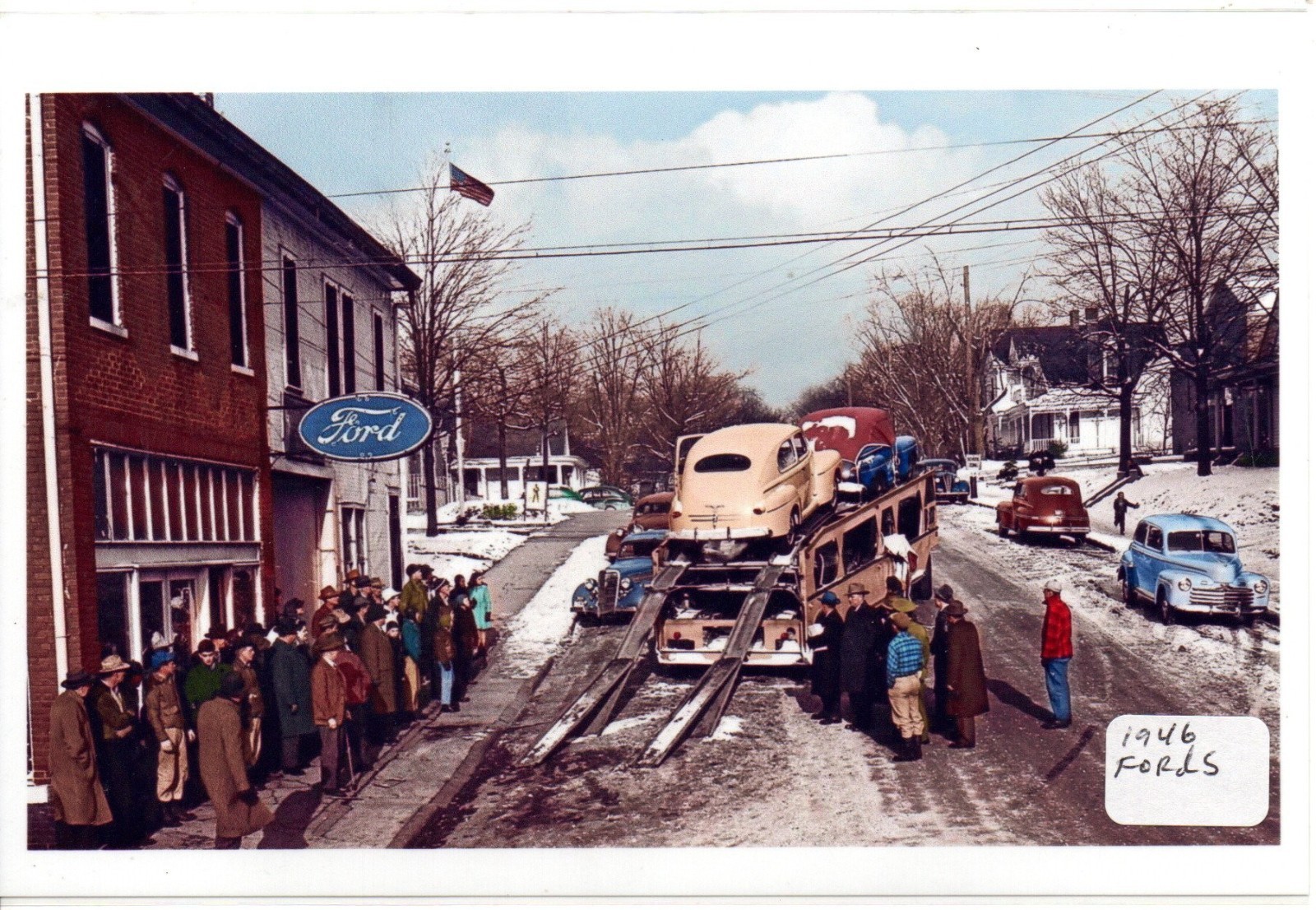 1946 Ford Cars Being Unloaded at Dealership Photo