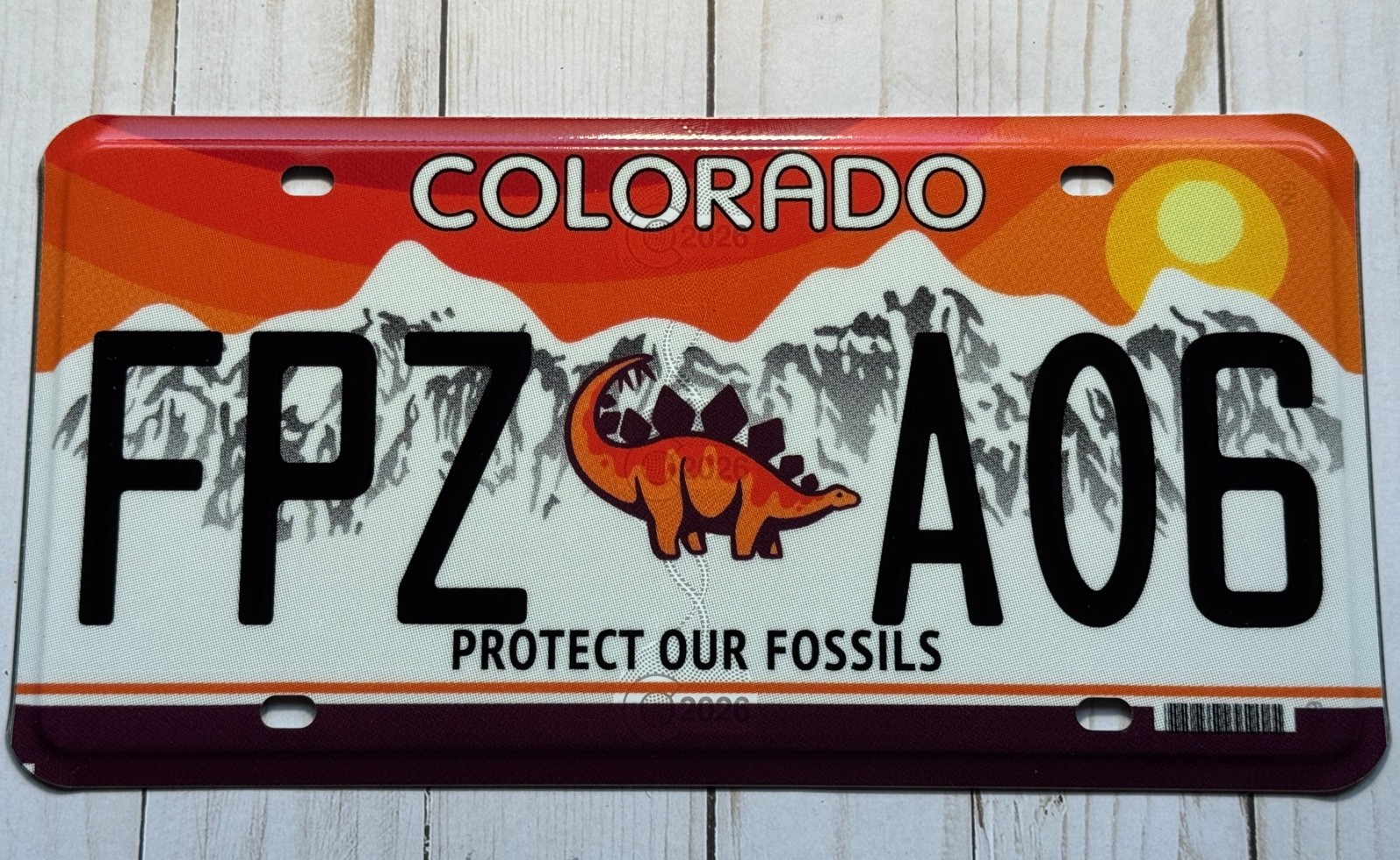 2022 Colorado Protect Our Fossils License Plate # FPZ A06 Excellent dinosaur