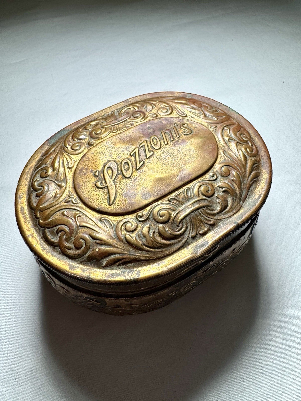 Antique Pozzoni's 1912 Brass Powder Puff Tin Box Embossed Lidded Trinket Dresser