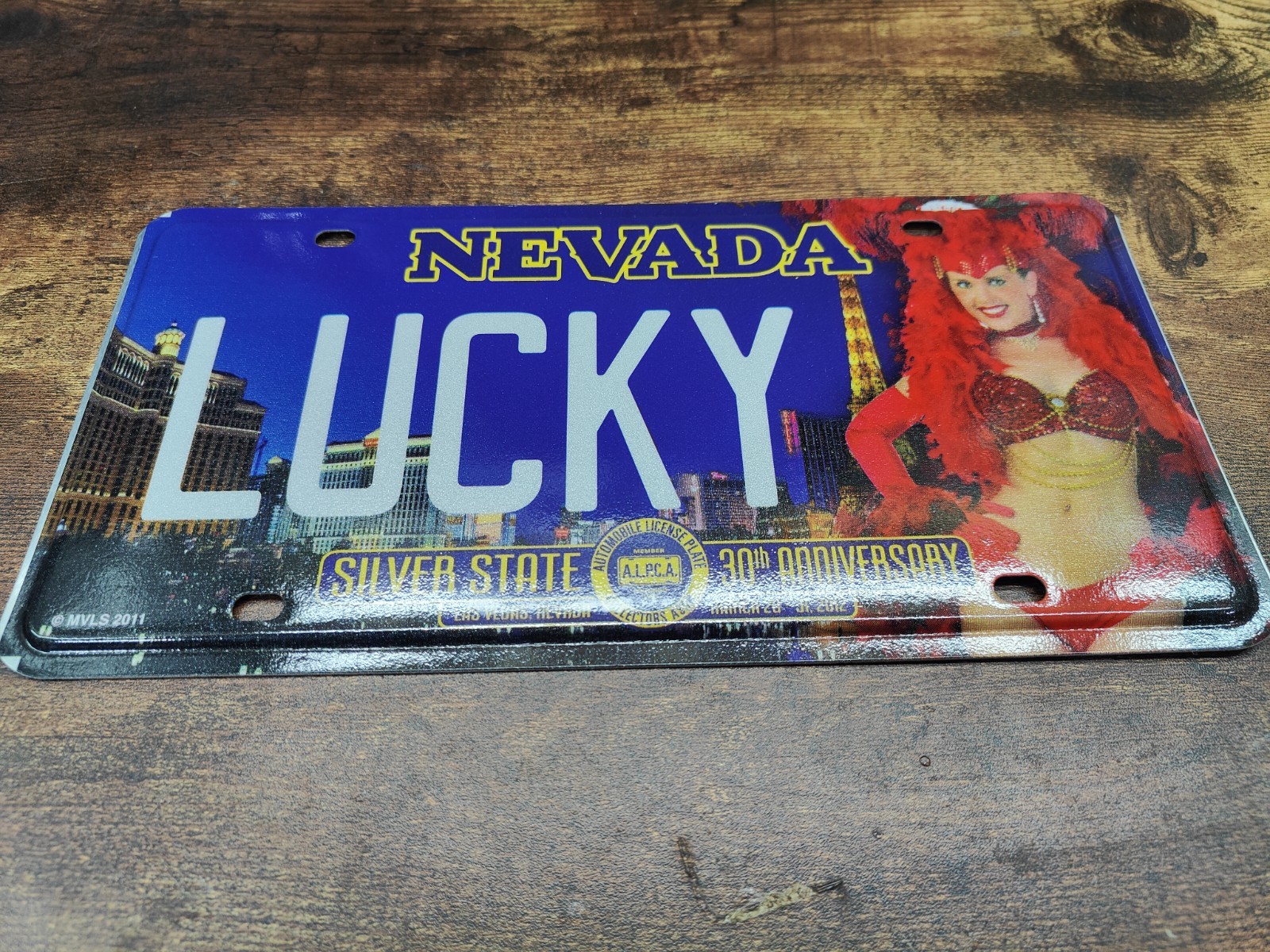 Nevada Las Vegas 🎰 License Plate Tag ALPCA showgirl Casino 💰🎲 2012 LUCKY 
