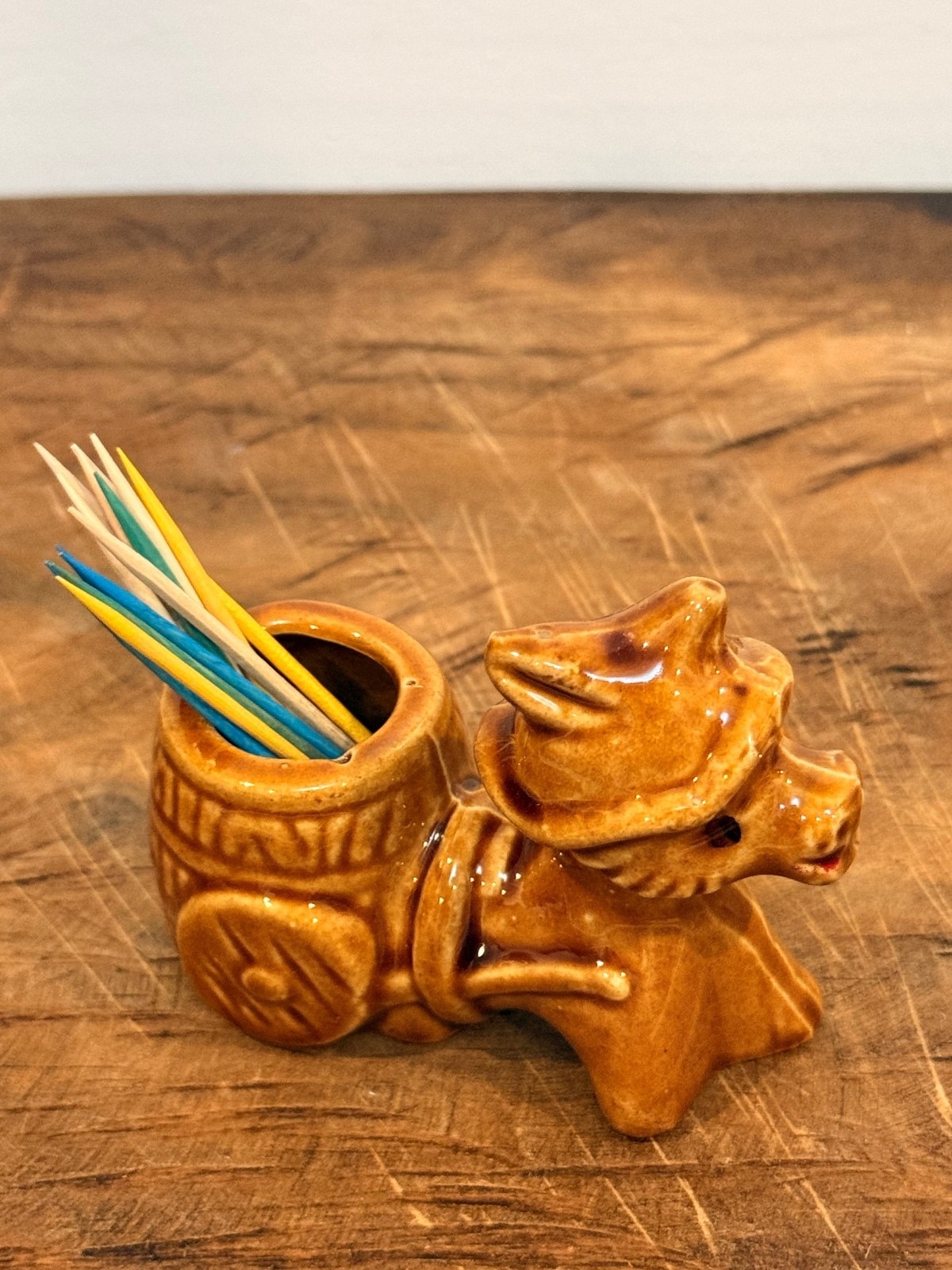 Vintage brown ceramic donkey with barrel toothpick or match holder