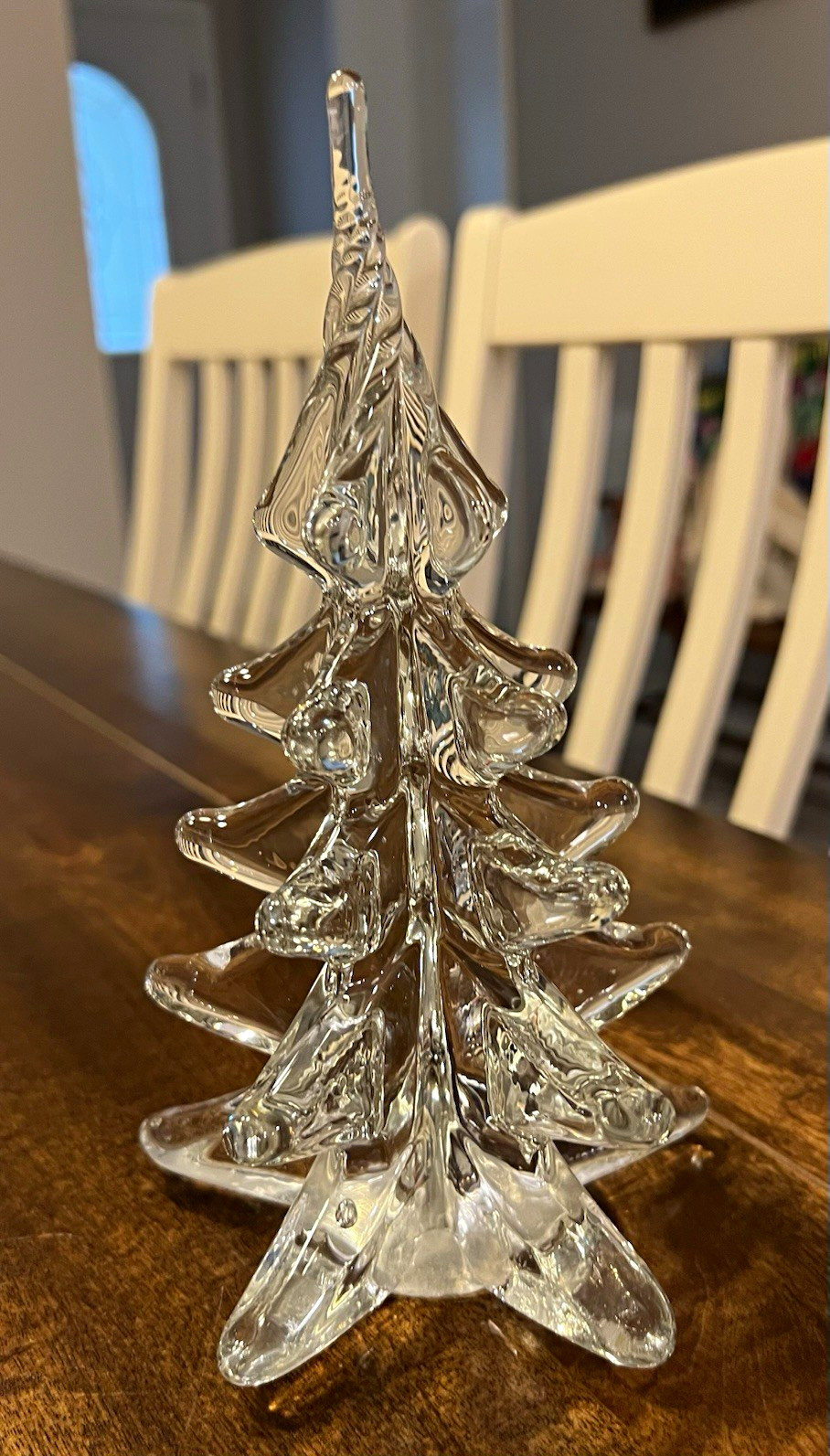 A 1992 Vintage Enesco clear lead crystal Christmas tree figurine.