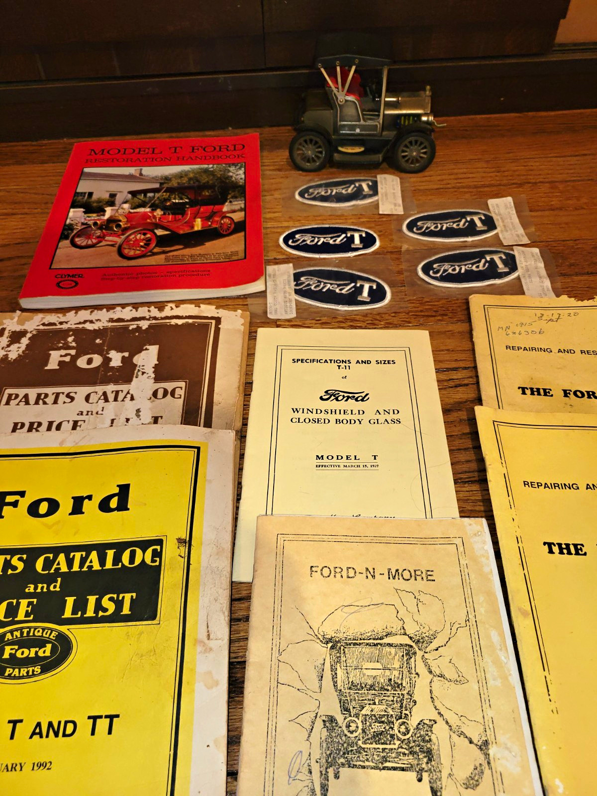 Vintage Ford Model T Lot - Working 1950s Toy Radio, 1983 Book, Manuals & Patches