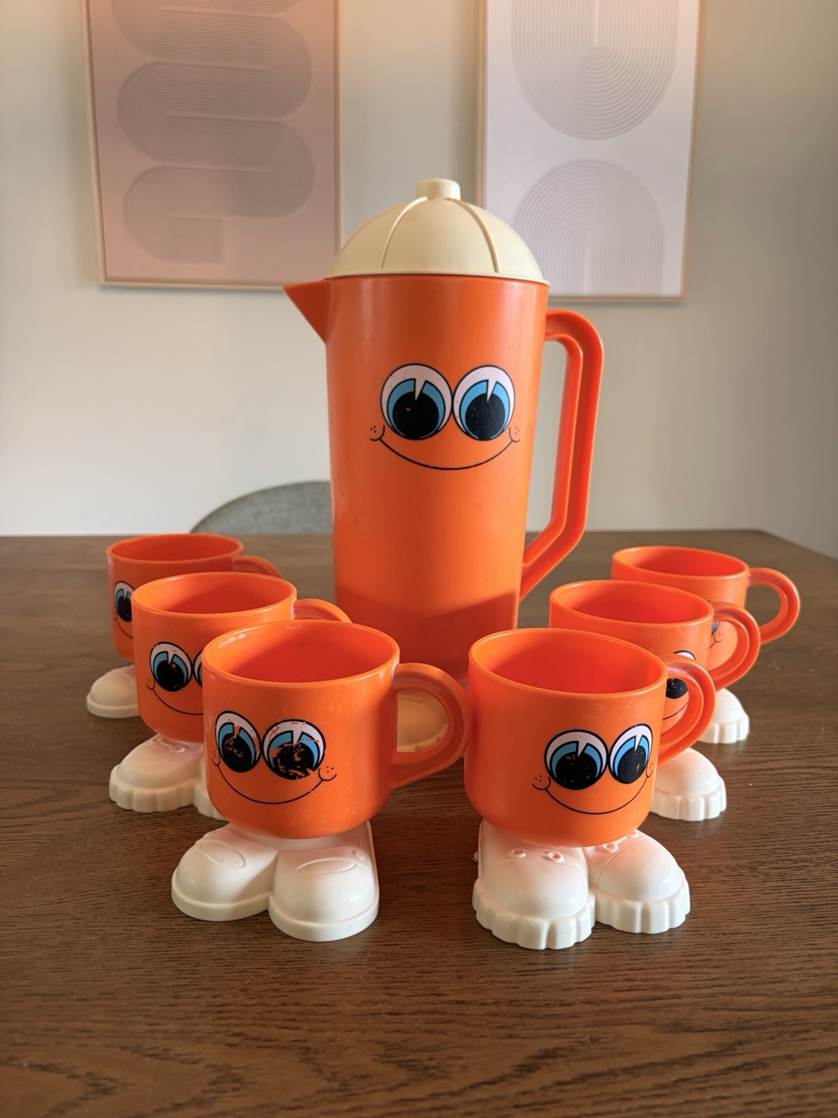 Vintage 1970s DEKA Footsie Tootsie Orange Pitcher & 6 Cups Smiley Face Set