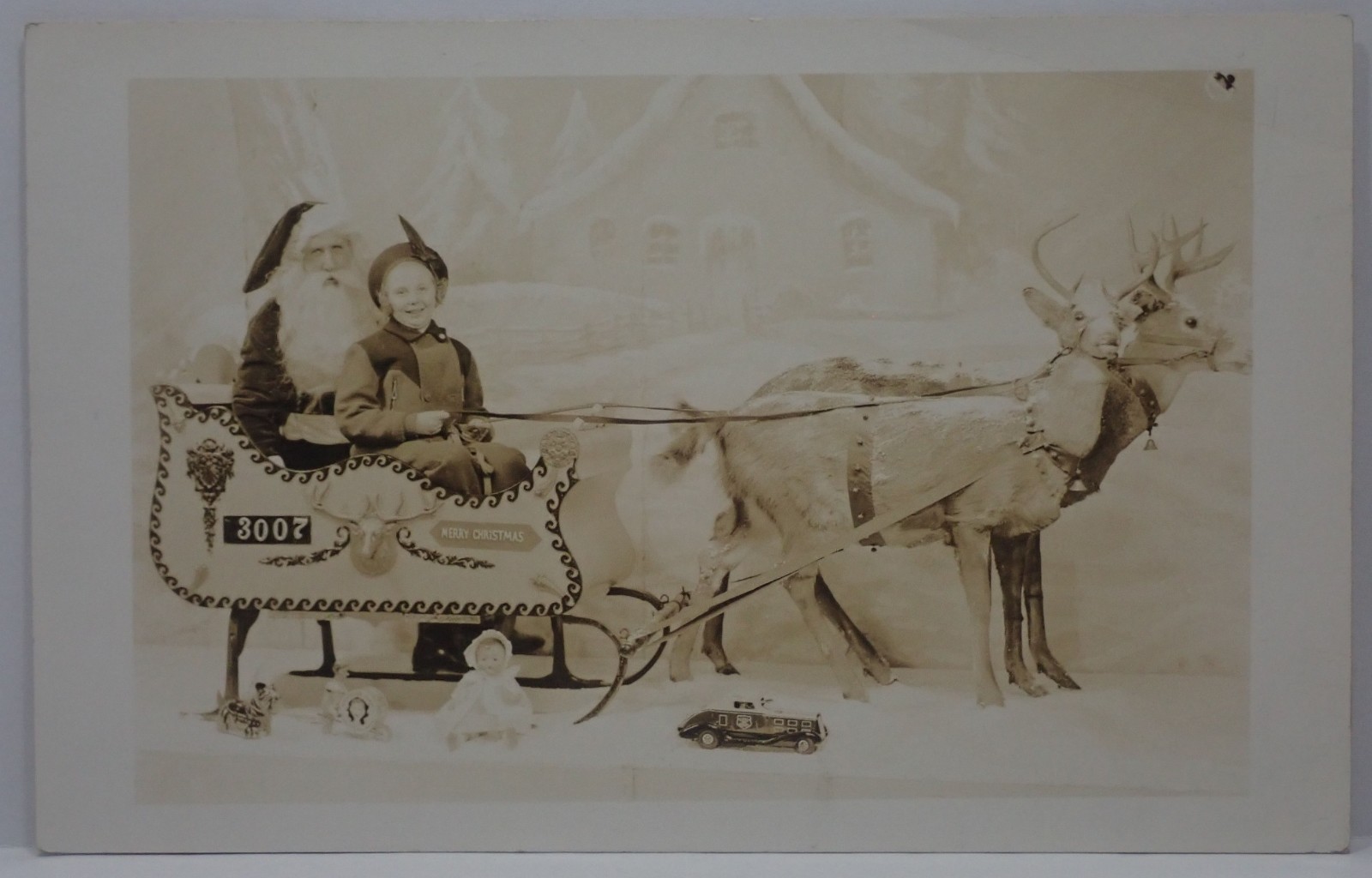 ANTIQUE DOPS RPPC SANTA SLEIGH w/ GIRL MARX TOYS & REINDEER DEPT. STORE POSTCARD
