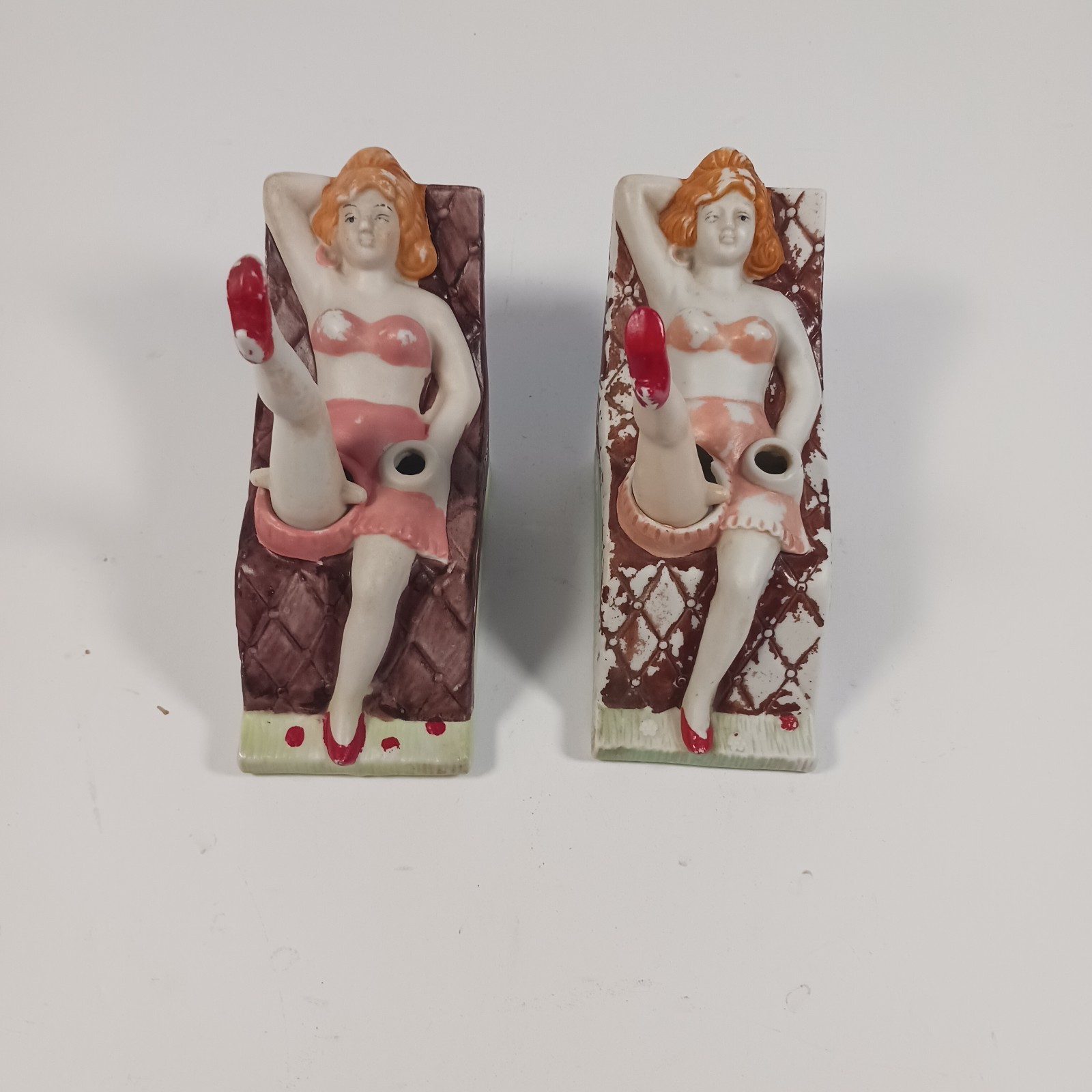 Vintage pair of naughty Nodder ASHTRAYS -Girl in 2pc Swimsuit w BOBBING Leg