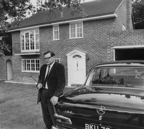 English novelist John Braine author of 'Room Top' moves into new h- Old Photo
