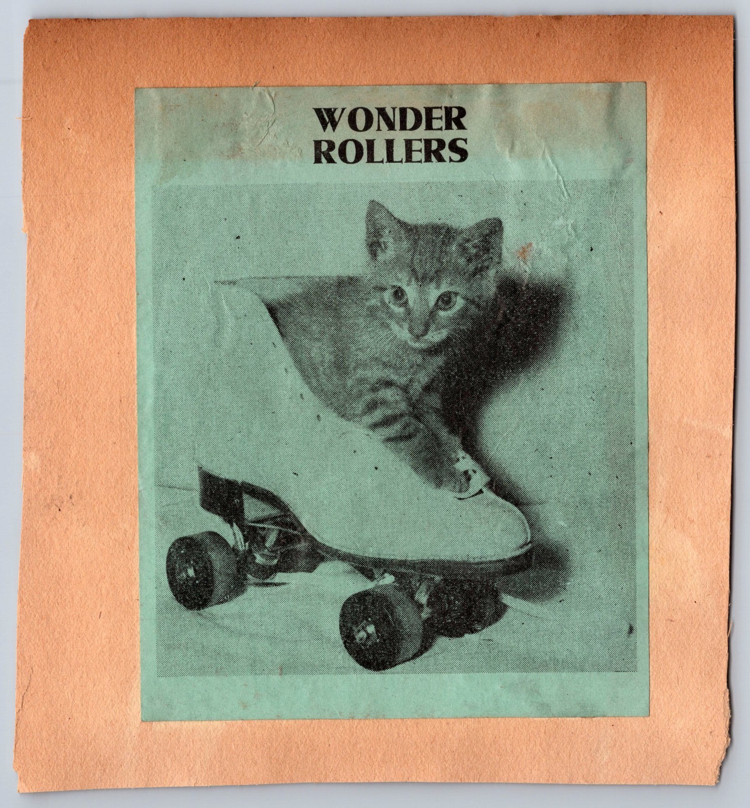 Wonder Rollers & 12th Street Market Roller Skating Ad Sticker on scrapbook page