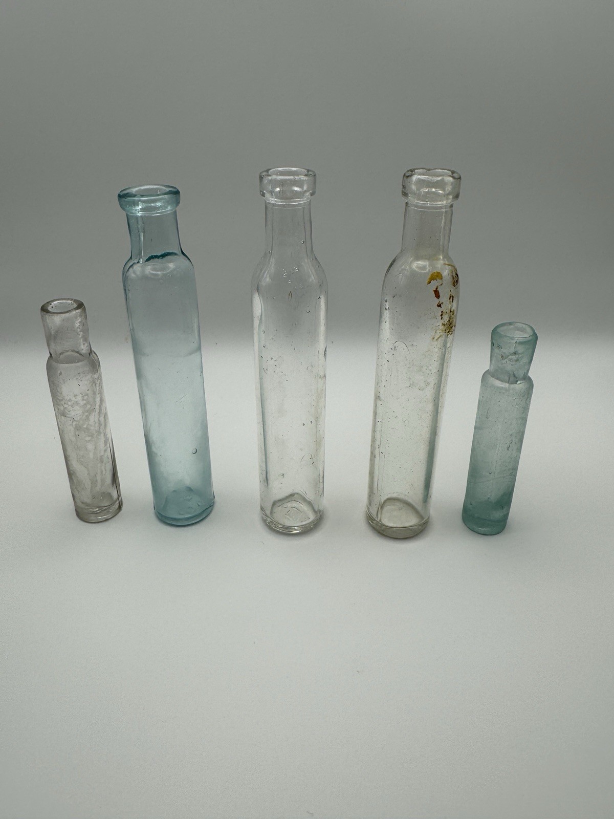 Five Small Cylinder Style Antique Glass Bottles/Vials