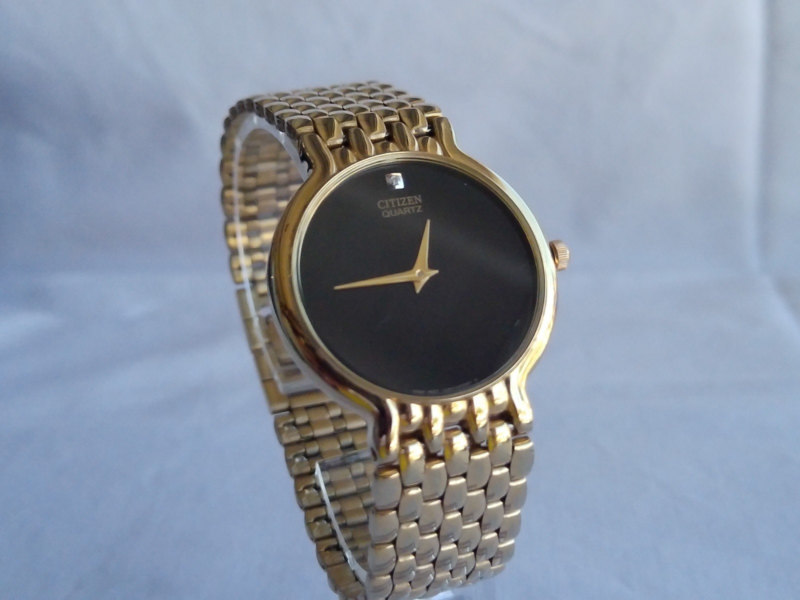 Vintage Citizen Quartz Watch Gold Tone Black Dial 34.2mm Diamond Accent 1992 Run