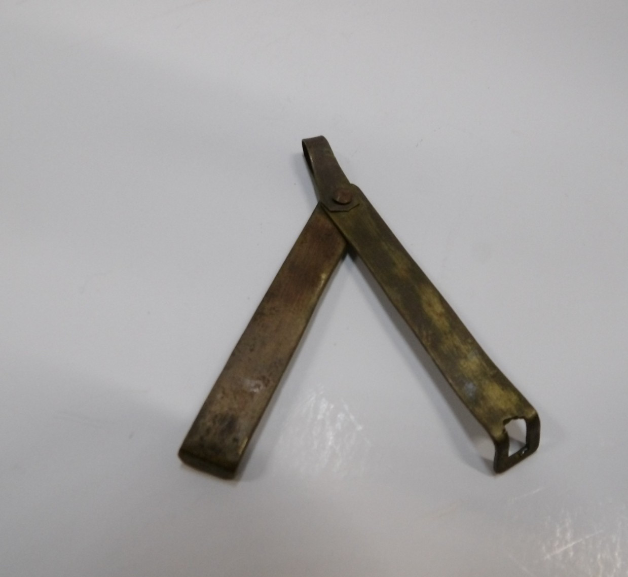 Antique old oriental padlock key in brass