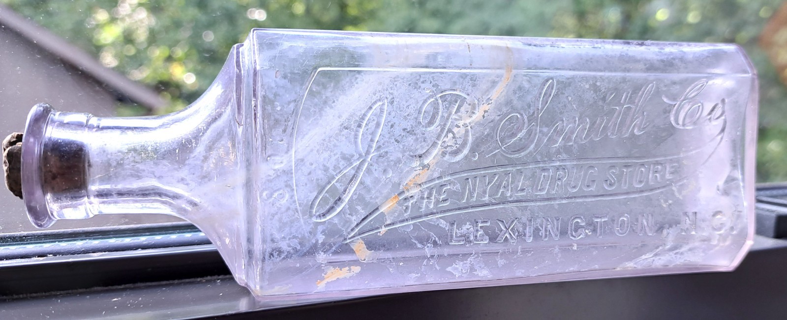 J B SMITH CO THE NYAL DRUG STORE LEXINGTON NC MEDICINE BOTTLE LIGHT PURPLE GLASS