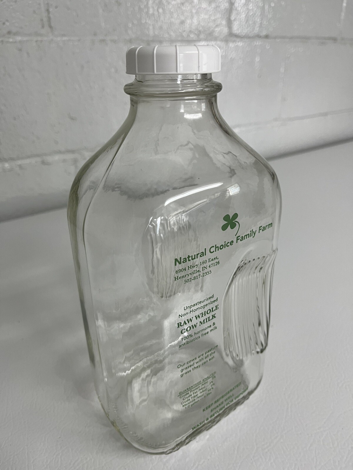 Glass Milk Bottles, new, With New Lids, labeled with out of business dairy.  