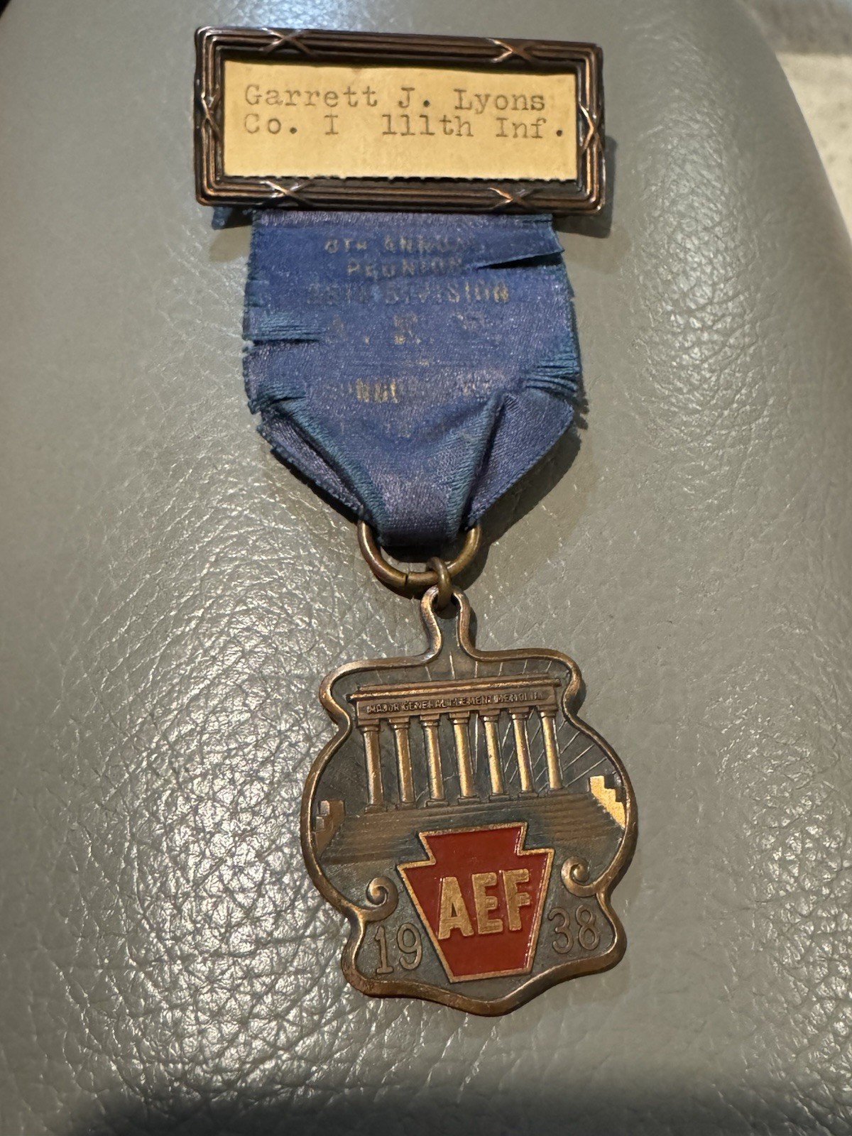 1938 AEF Reunion Badge Named Garrett J. Lyons 111th Infantry PA Balfour WWI