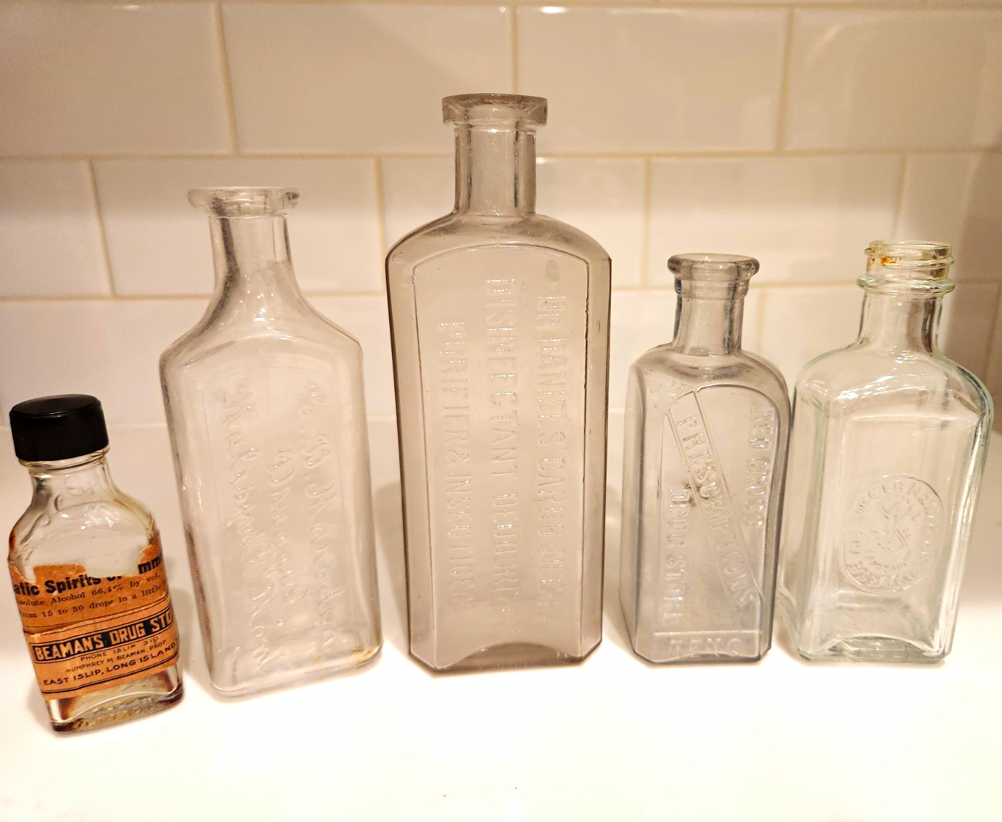 Lot of 5 Clear Embossed Glass Medicine Bottles Includes Red Cross Prescriptions