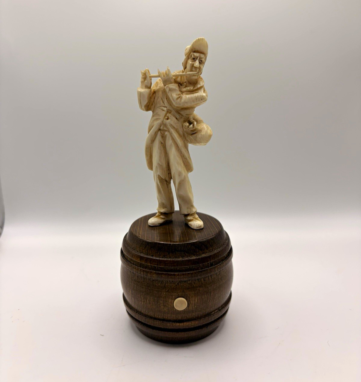 Vintage Hand Carved Flute Player Figurine Wood Barrel Base Folk Art