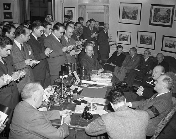 President Franklin D Roosevelt smoking a cigarette favorite long - 1941 Photo