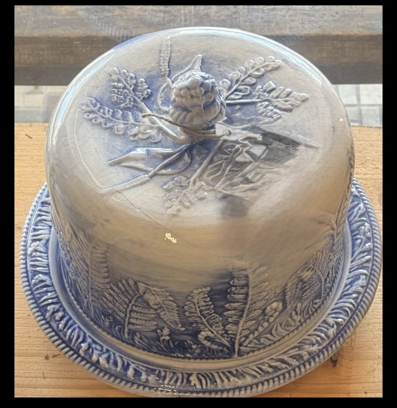 vintage blue-and-white ceramic cheese dome and underplate