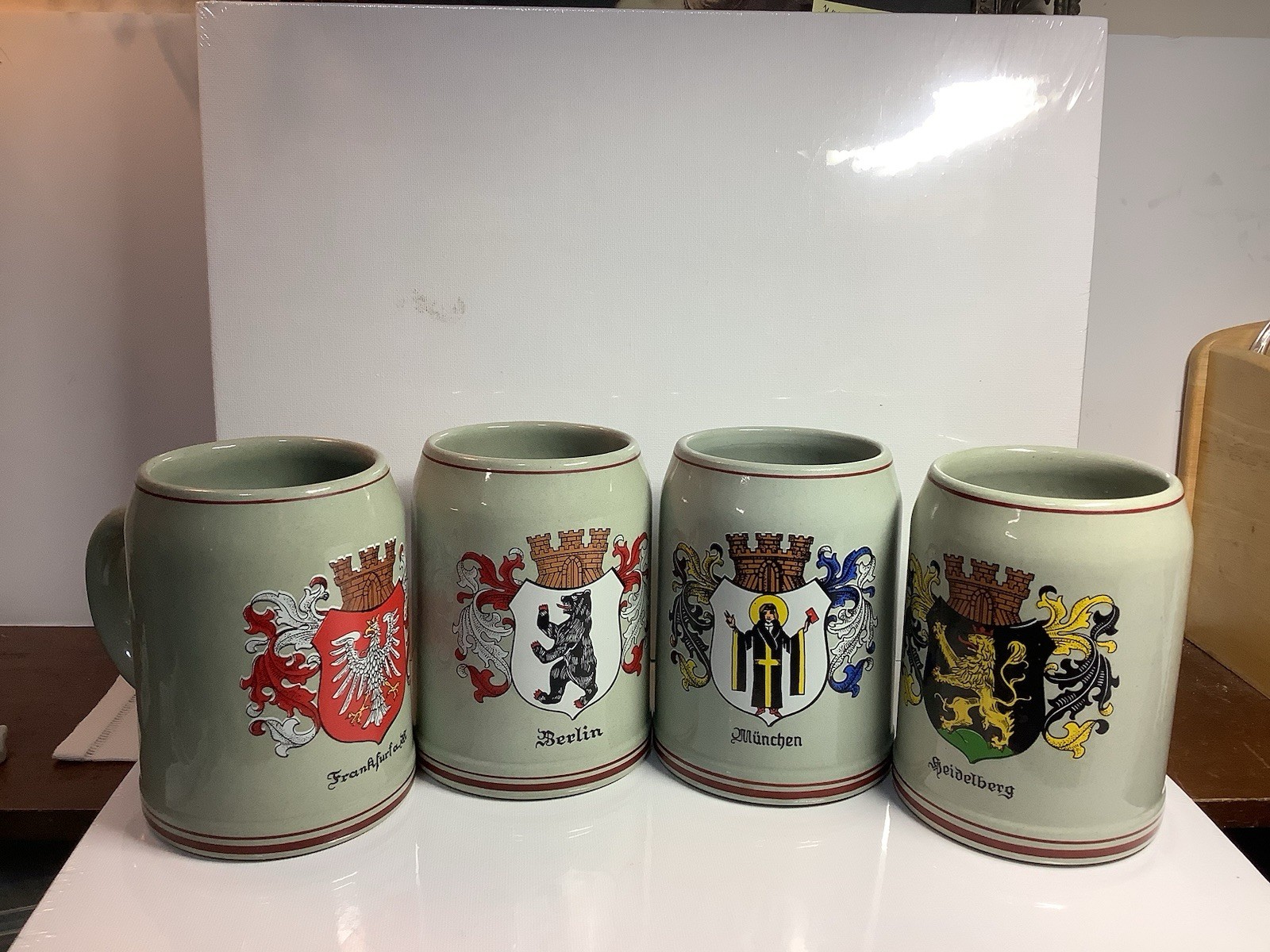 MT1083 Lot Of 4 Vintage German Stoneware Beer Mugs/Steins  Coat Of Arms