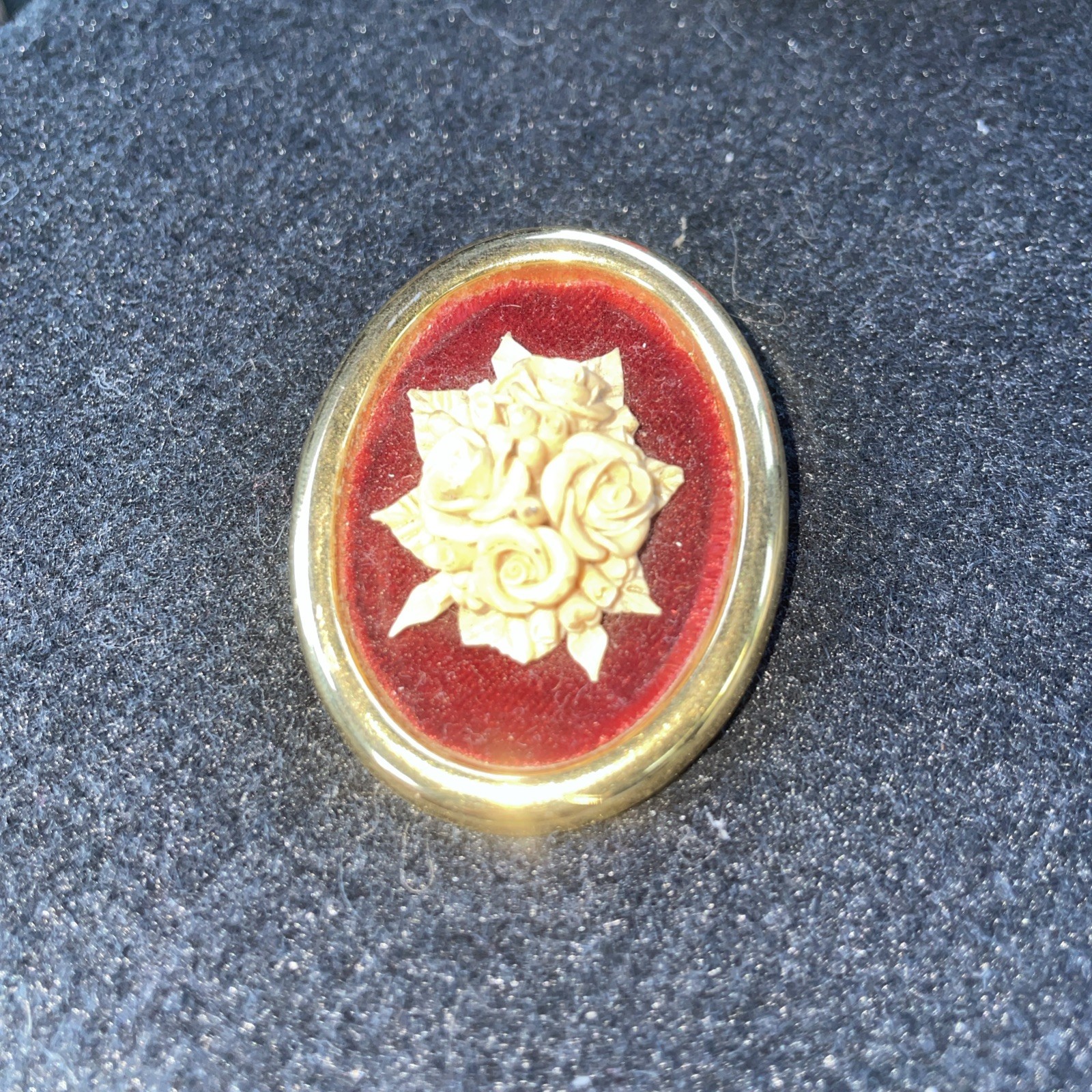 VTG Victorian Cameo Brass Resin Flower Brooch with Red Velvet Background
