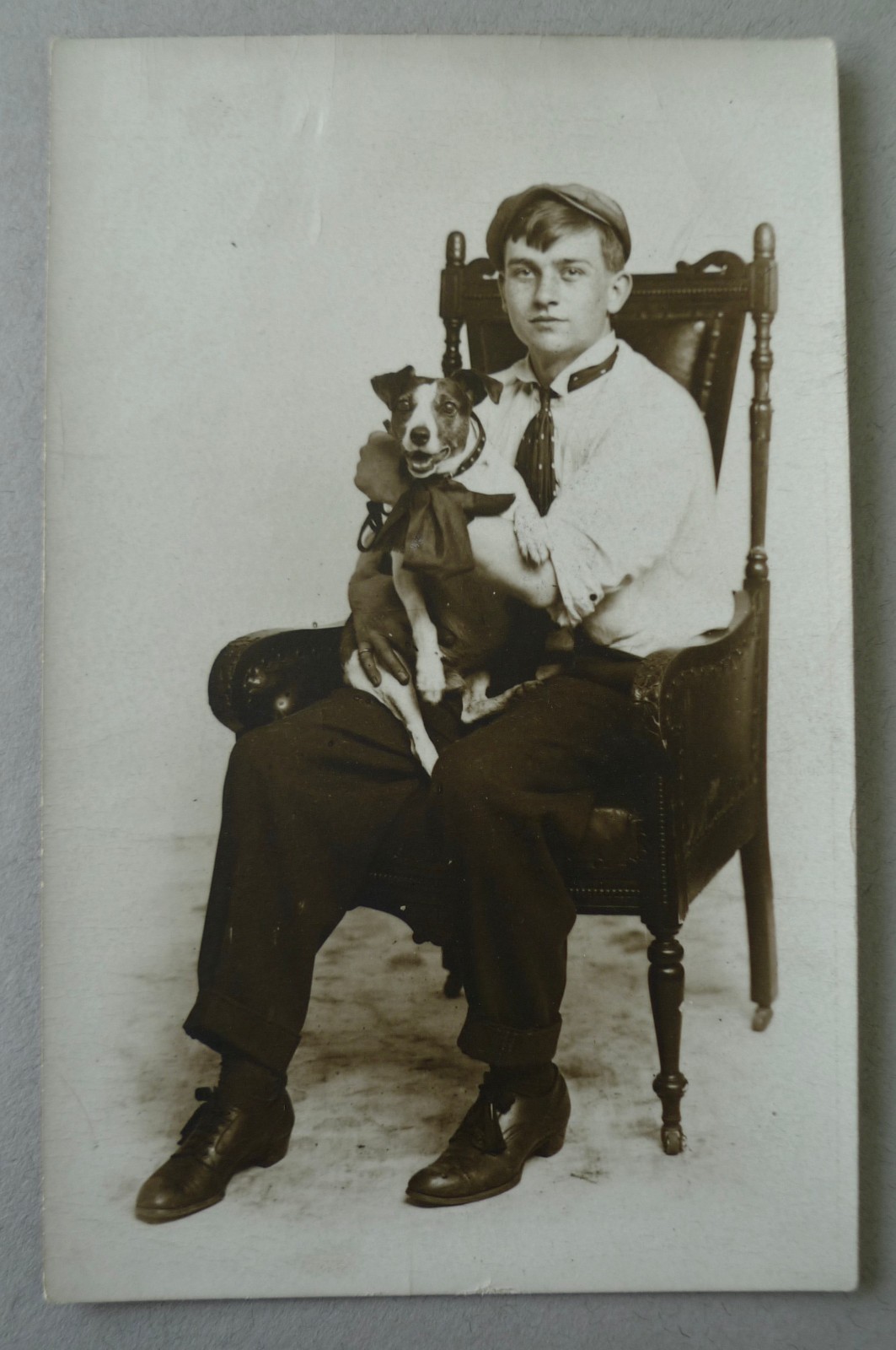 Antique 1907 rppc portrait young man with dog posed vintage real photo postcard
