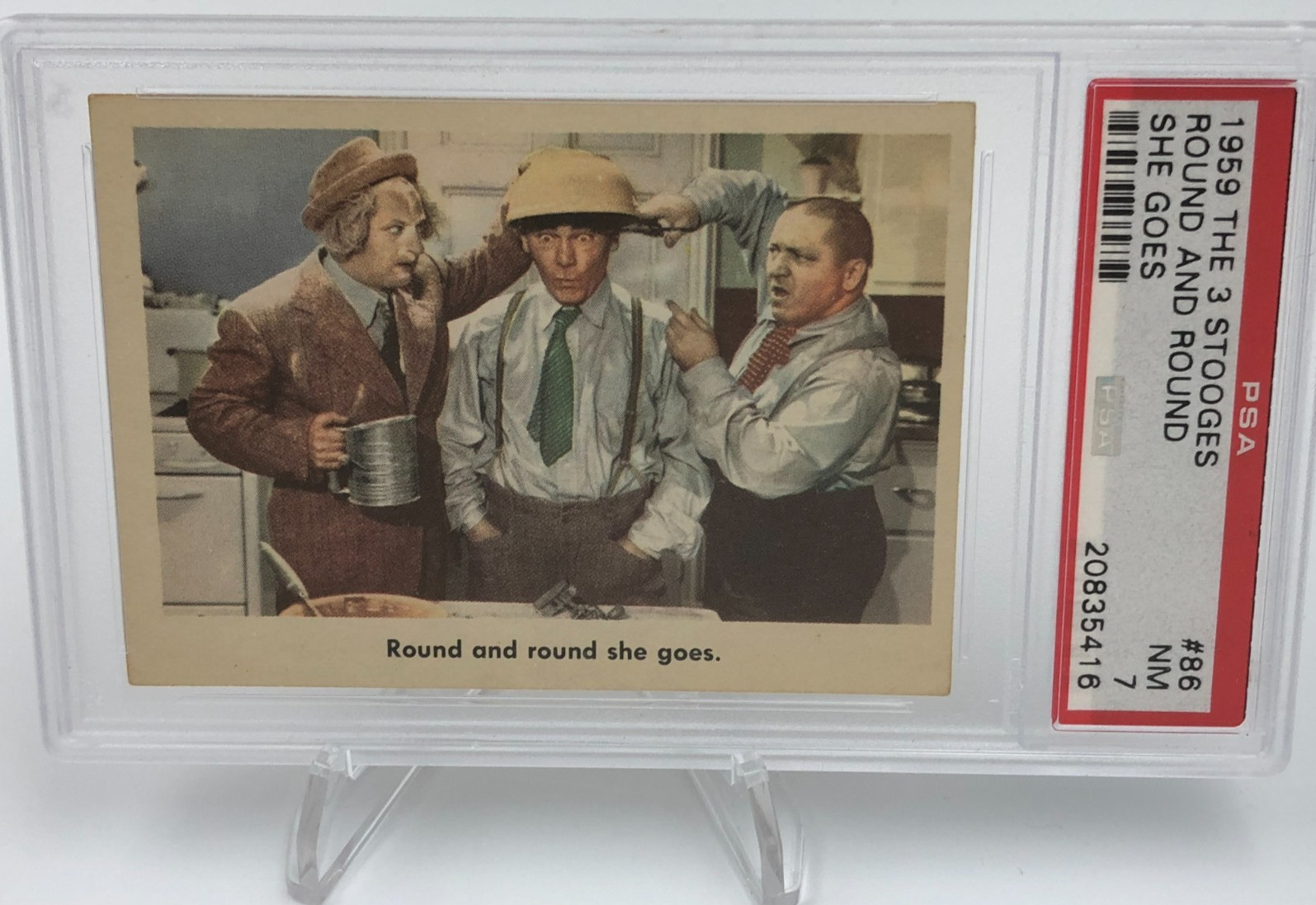 1959 THE THREE STOOGES Trading Card ROUND AND ROUND SHE GOES #86 grade PSA 7