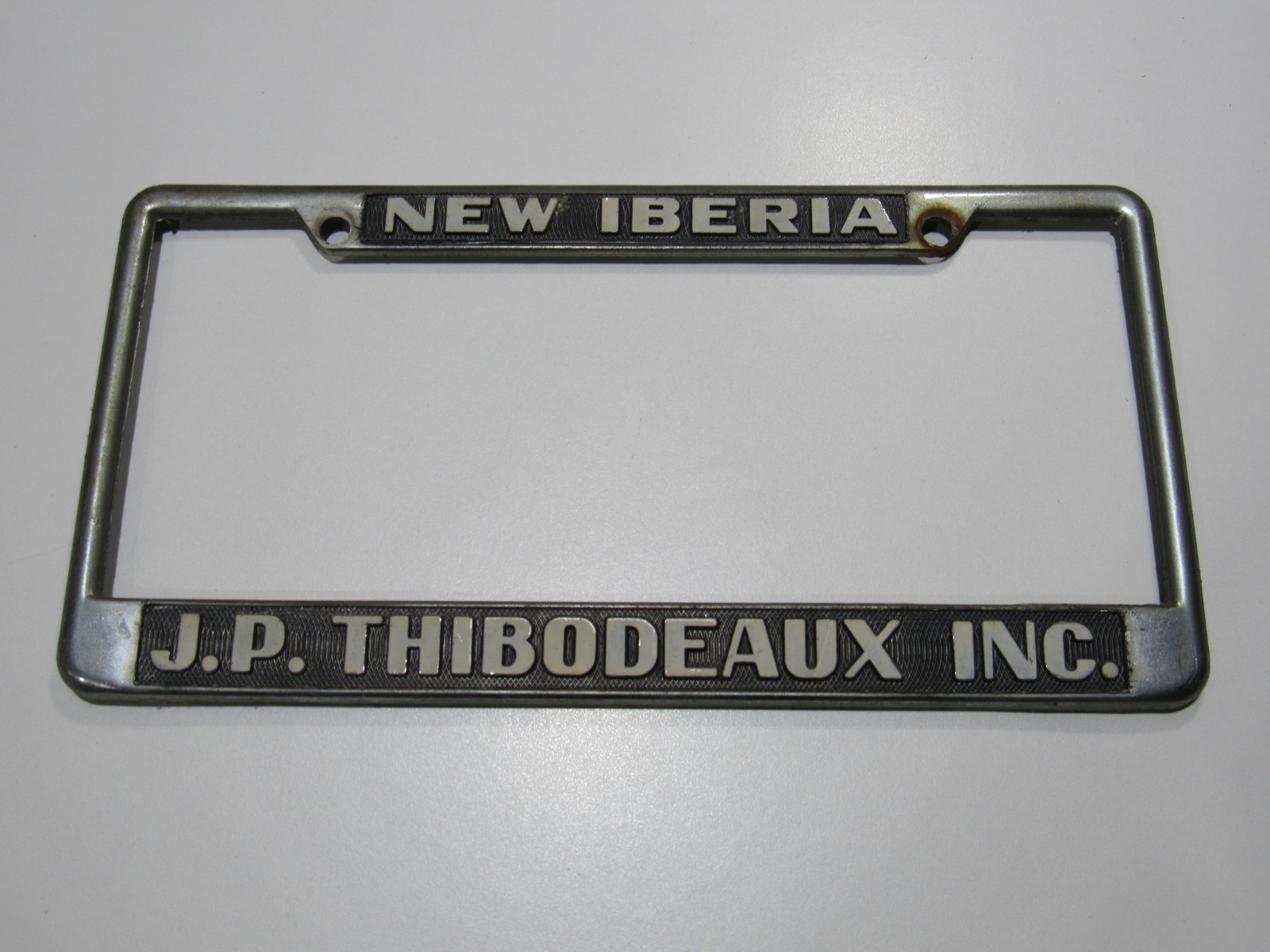 VTG J.P. Thibodeaux Cadillac-Olds New Iberia LA Metal License Plate Frame Tag