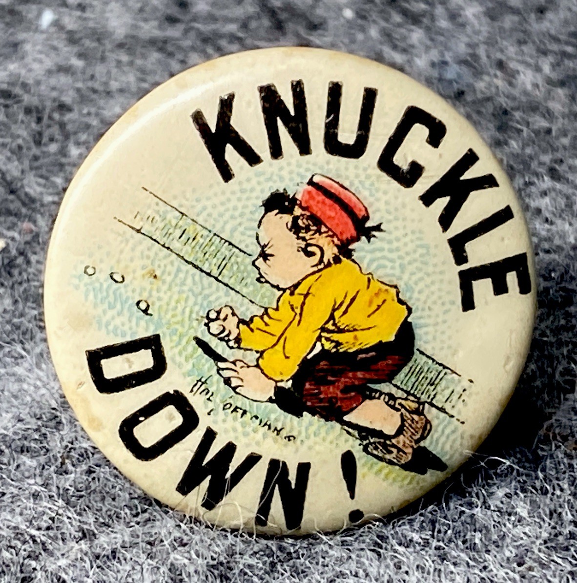 😎1910 Hassan Cigarettes Pinback “Knuckle Down” A Boy Playing Marbles Rare Find
