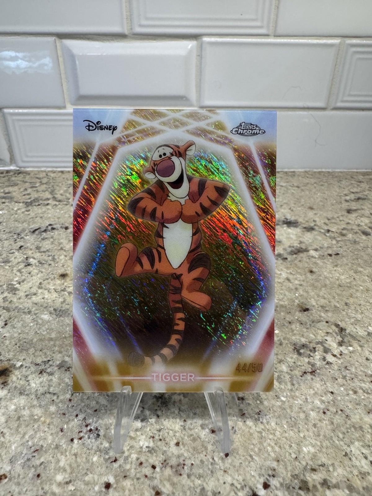 2026 Topps Disney Neon Tigger Chrome Neon Etch Gold Shimmer CNE-7 #44/50 Card