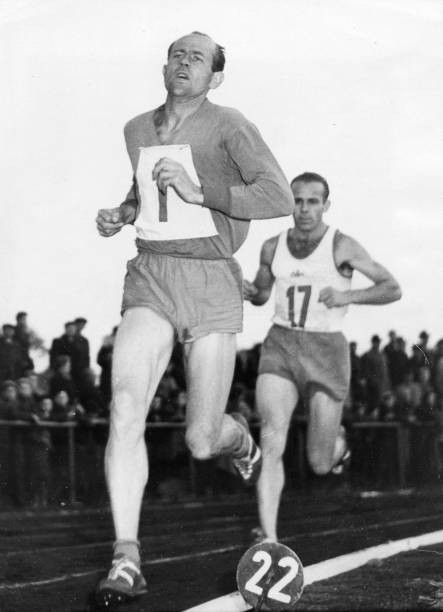 Czechoslovak athlete Emil Zatopek breaks 25 km world record at an - Old Photo