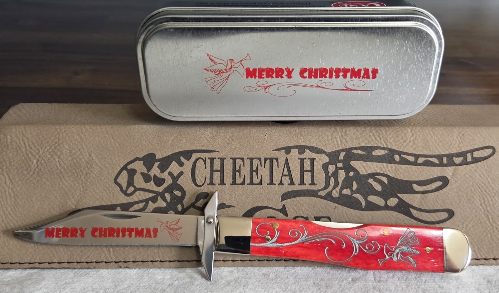 RARE CASE CHEETAH ENGRAVED CHRISTMAS RED BONE HANDLES 61111 1/2.