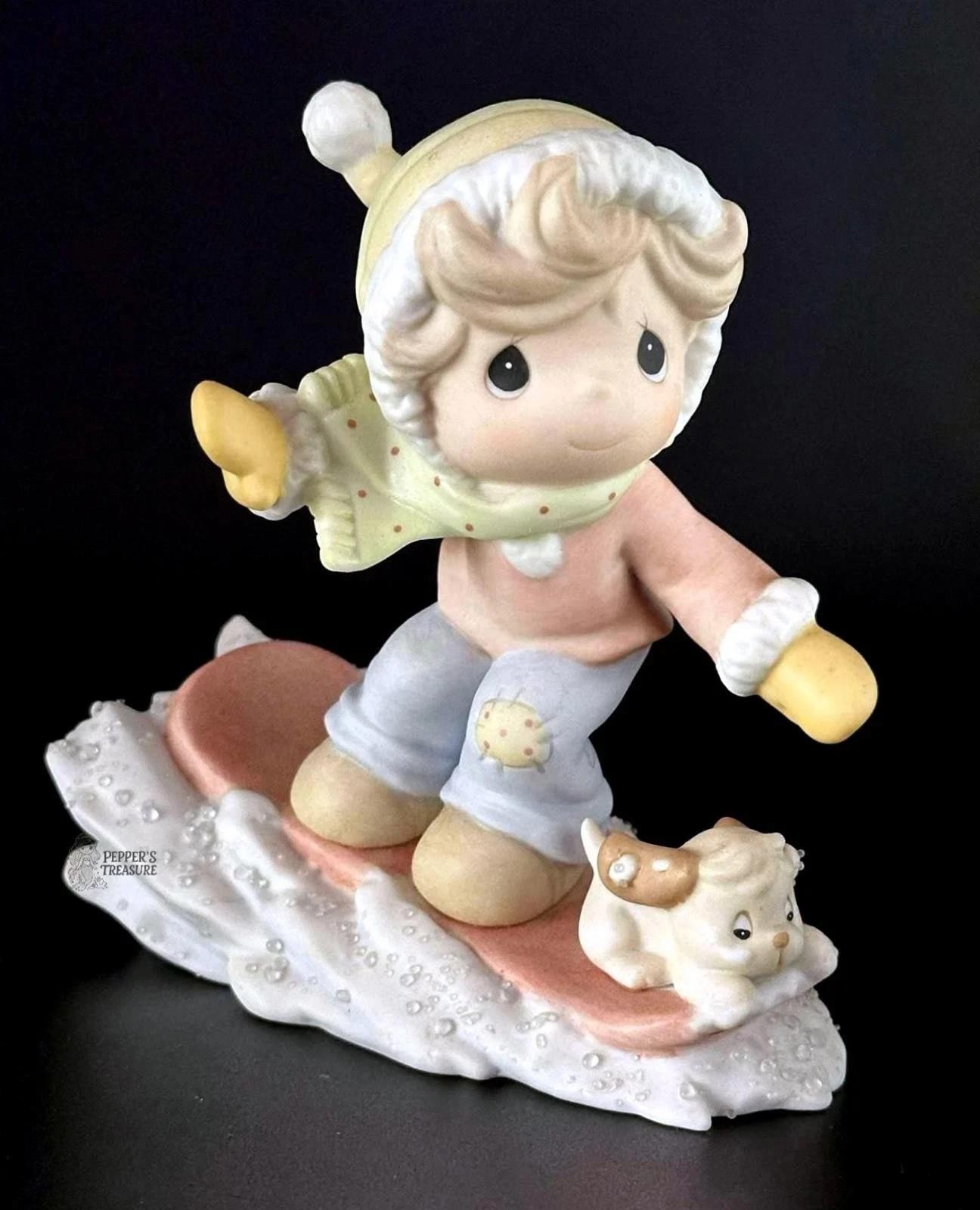 Adorable Porcelain Skating Figurine with Puppy