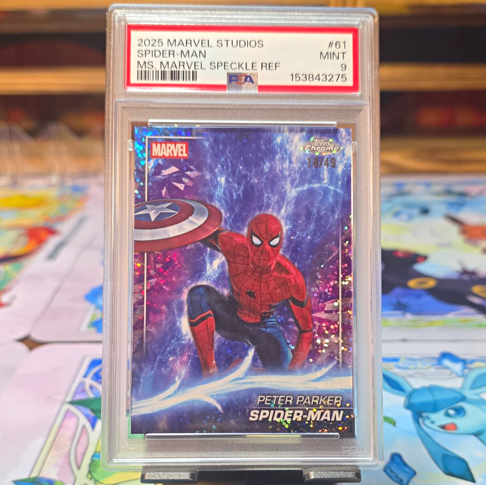 2025 Topps Marvel Studios Spider-Man #61 Ms. Marvel Speckle Refractor /49 PSA 9