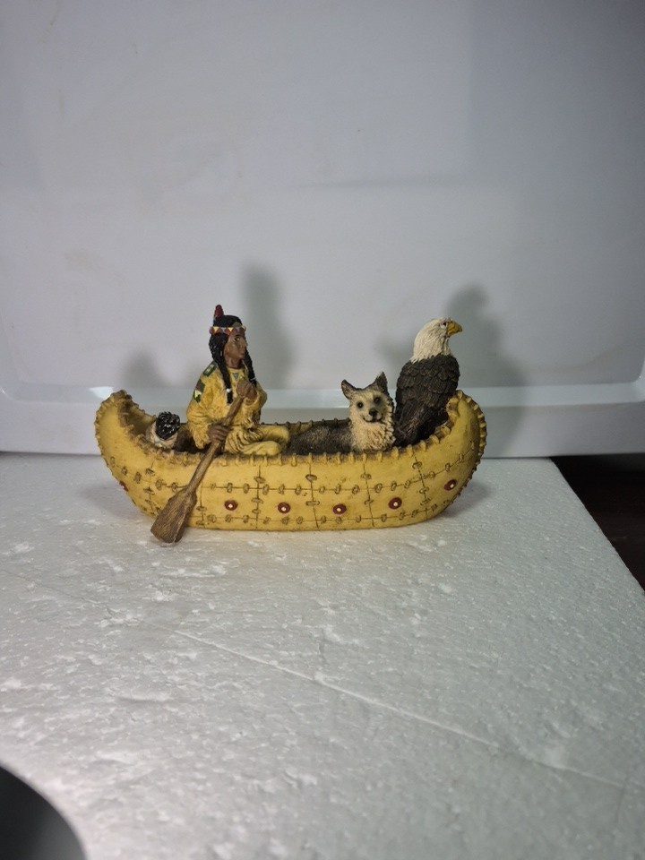Vintage Young Native Indian In Canoe With Wolf and Bald Eagle ,Resin Figurine 