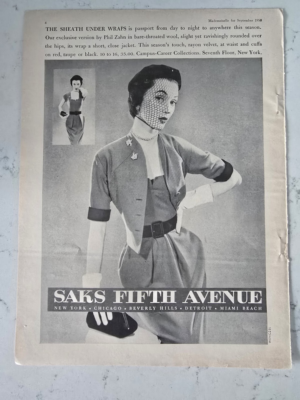 1950 Women\'s Campus Career dress Saks Fifth Avenue Dovima vintage fashion ad