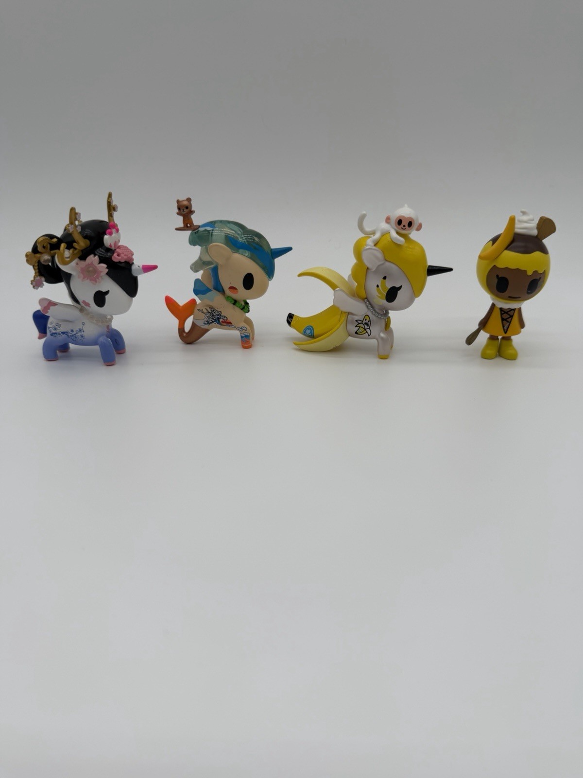 Tokidoki Lot of 4 Unicorno Blind Box Figurines And One Figure