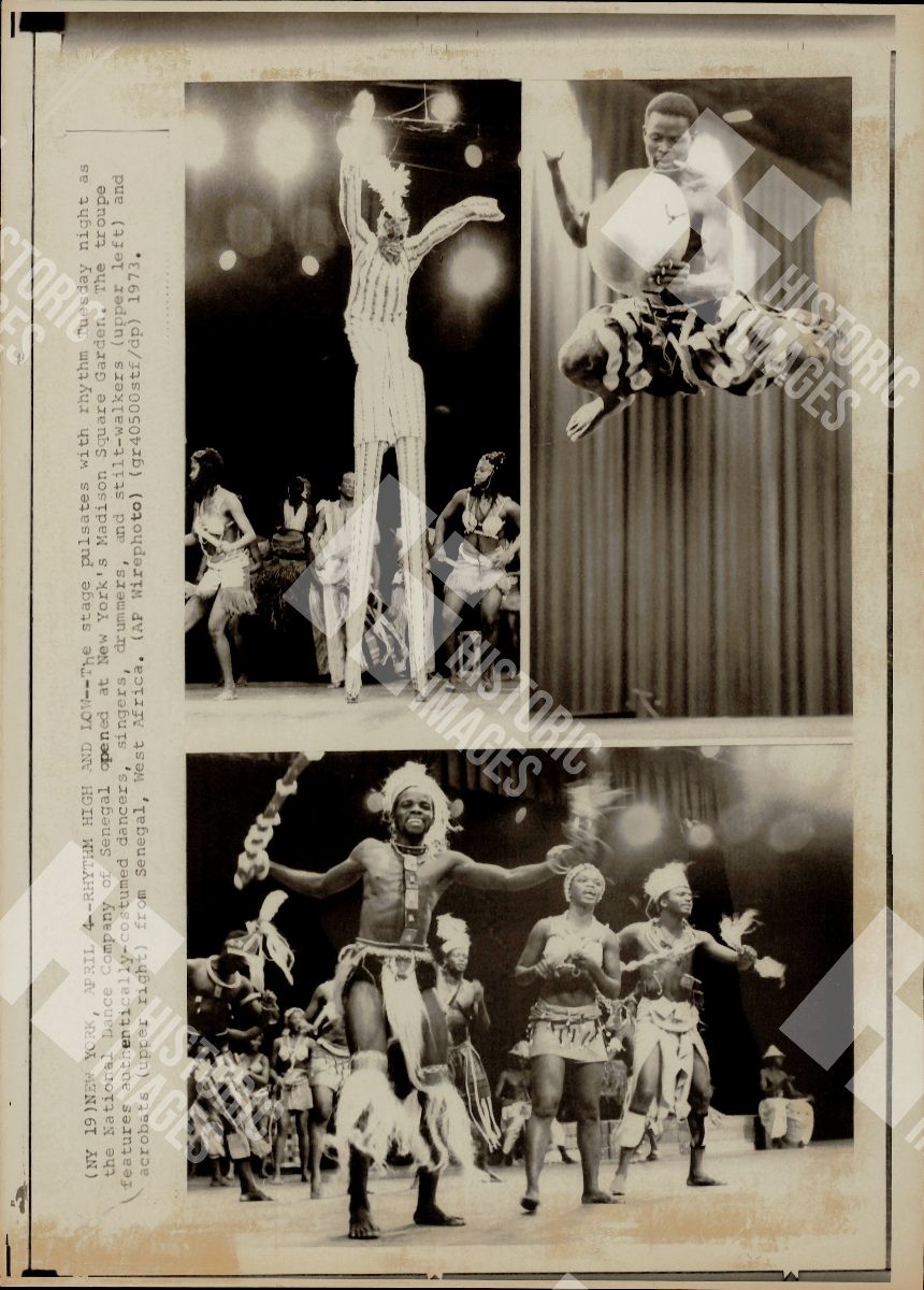 1973 A stage performance of dancers and musicians from Senegal