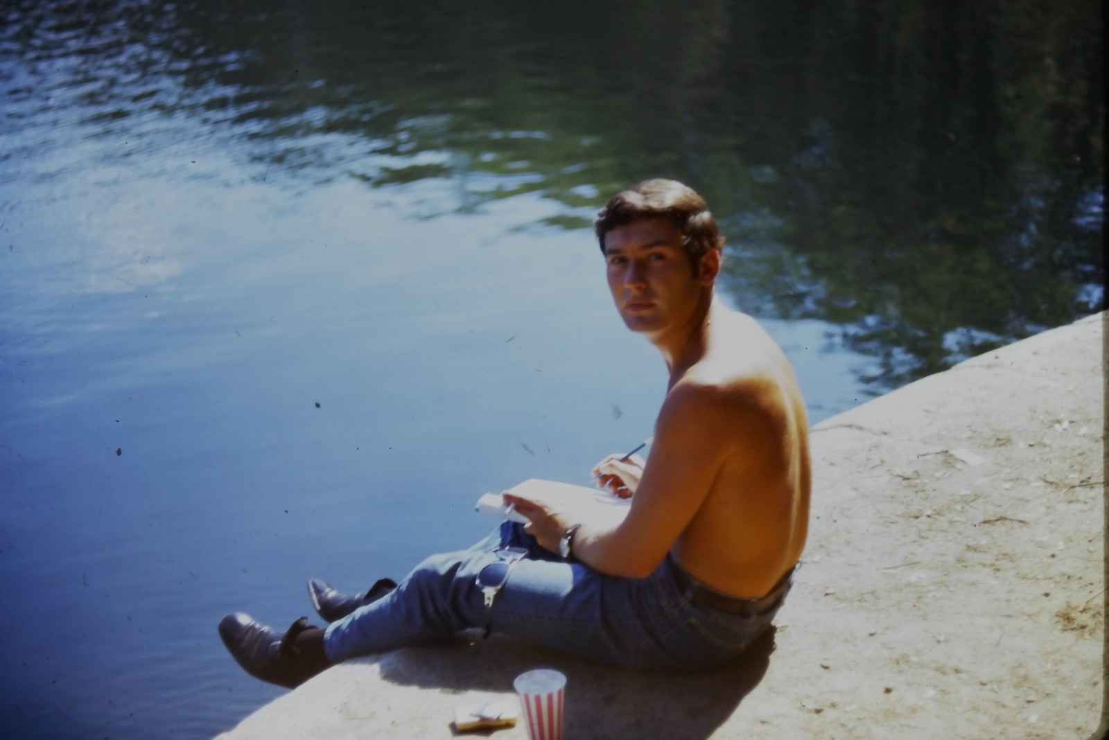 c1970\'s Kodachrome 35mm Slide Shirtless Man Writing Notepad Wall Concrete Water