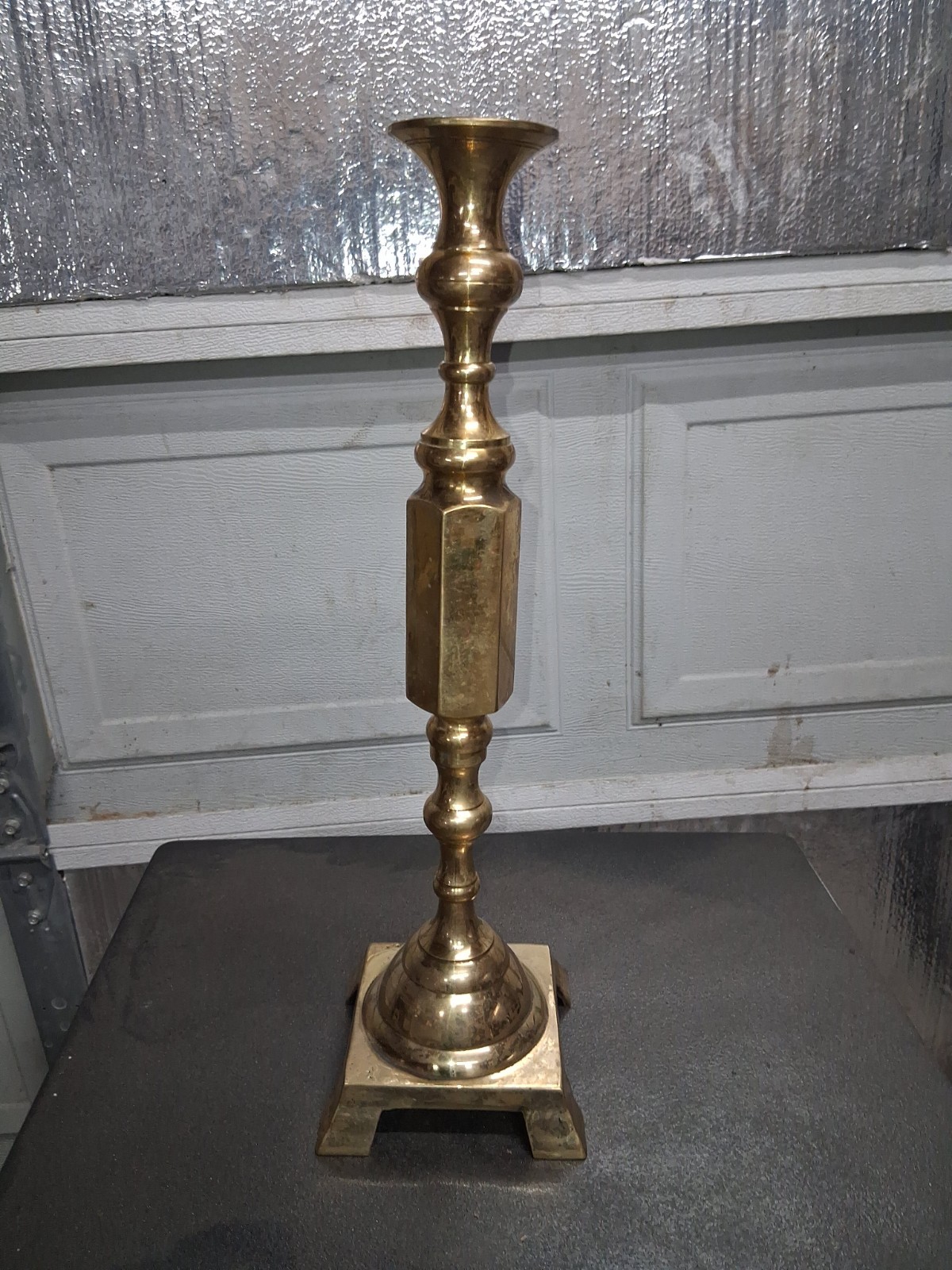 vintage large solid brass altar-style candlestick, featuring a distinctive...