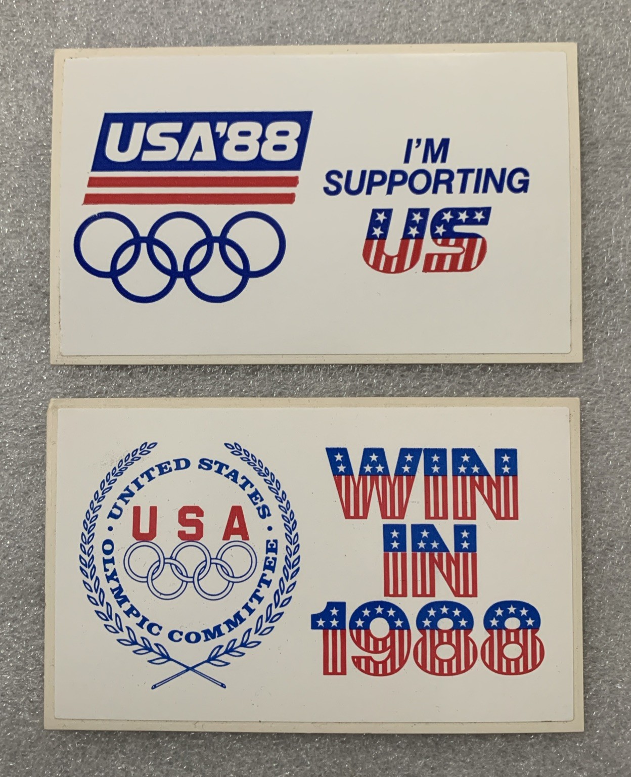 VINTAGE “I\'M SUPPORTING US USA” 1988 SUMMER OLYMPICS And “WIN IN 1988” STICKERS