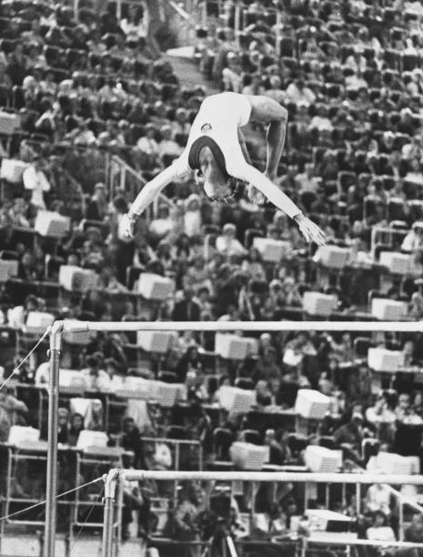 Year-old Russian gymnast Olga Korbut action asymmetric bars Mu- 1972 Old Photo