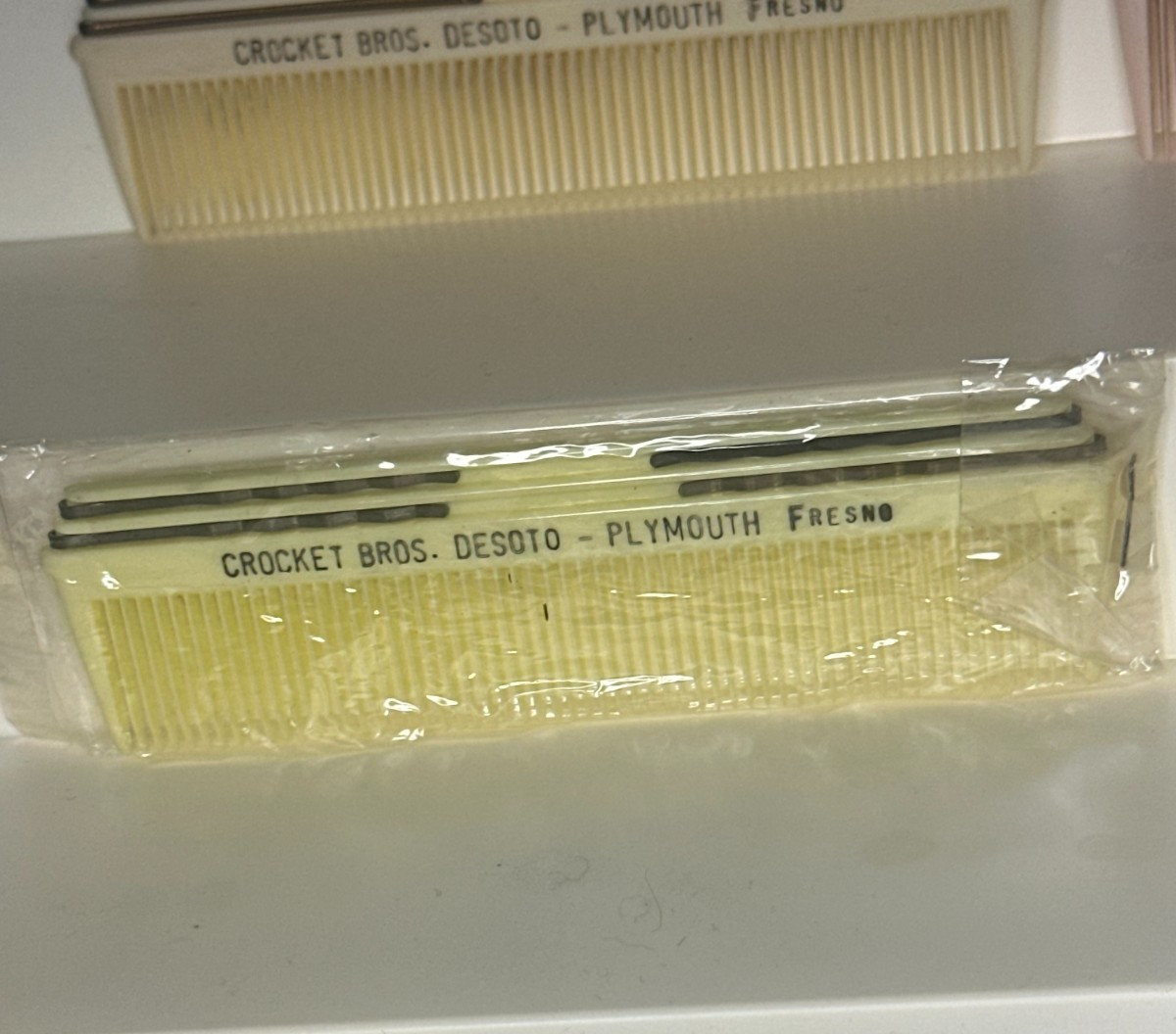 VTG 50s one celluloid Advertising Pocket Comb Bros. DESOTO PLYMOUTH FRESNO
