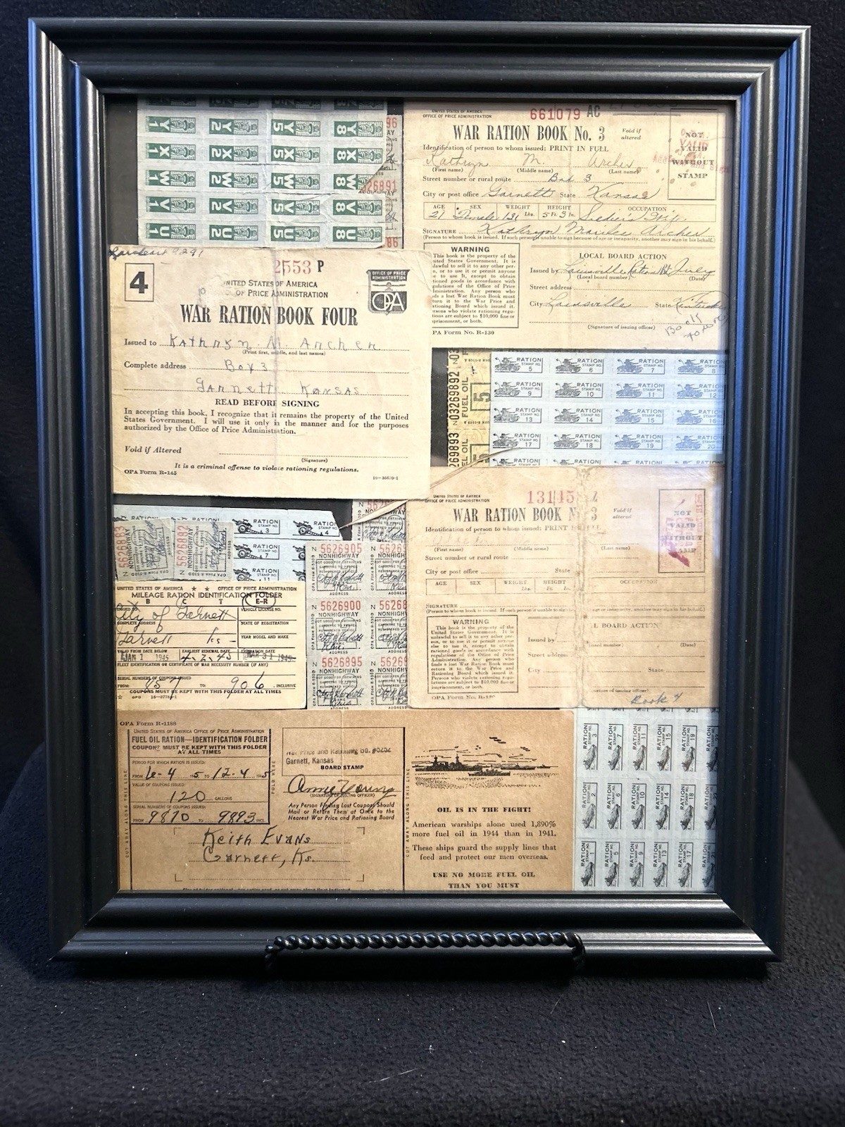 Framed collection, World War II Ration Books, And Unused Ration Stamps