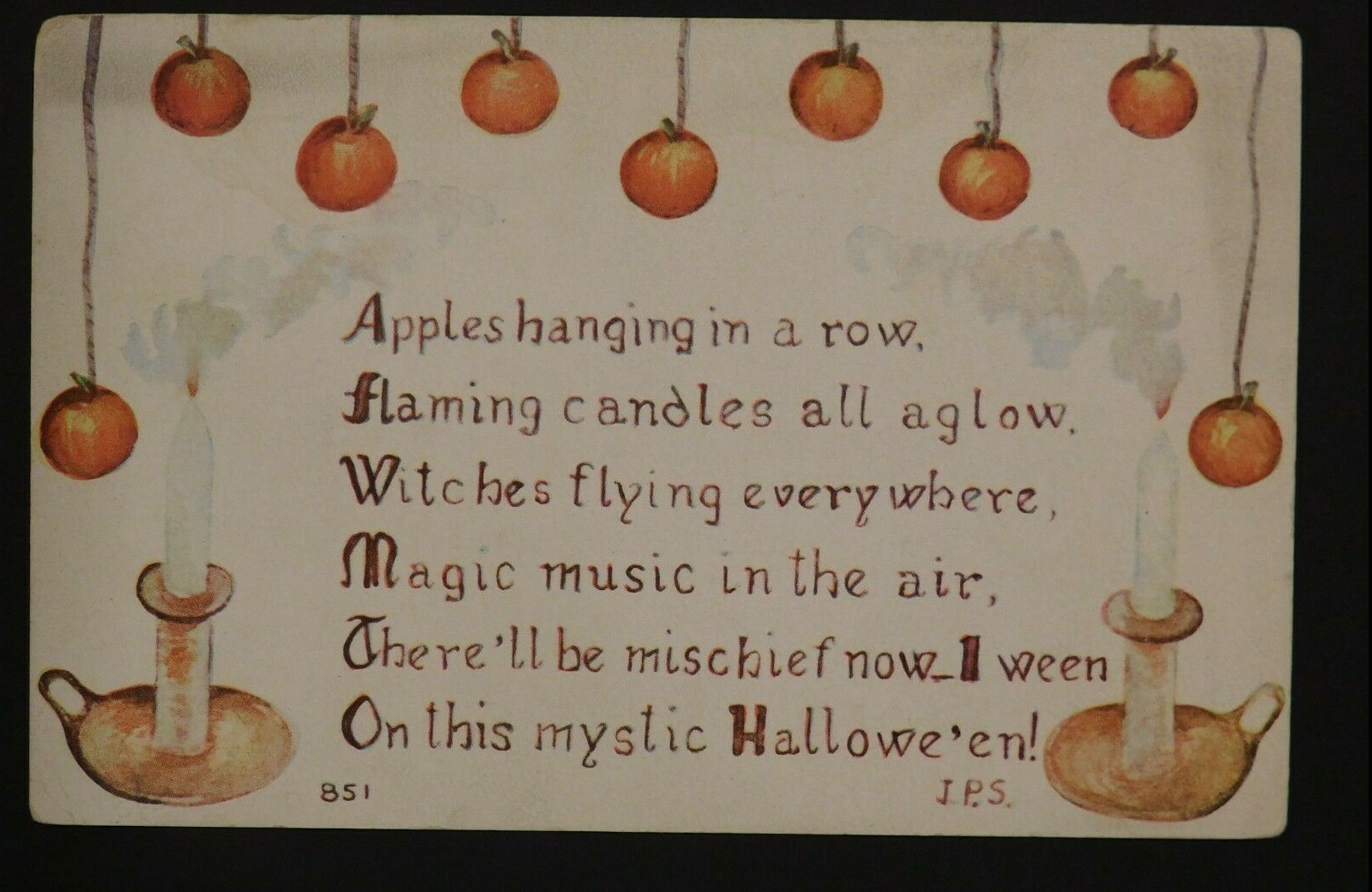 1910s F.A Owen Co. Halloween Postcard Hanging Apples and Candlesticks 